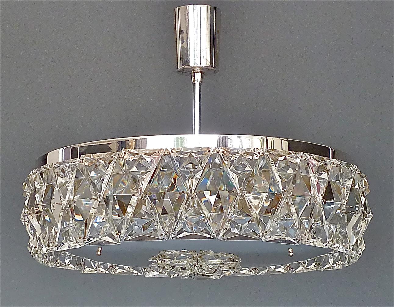 Large and early midcentury Bakalowits semi flushmount chandelier or ceiling light, Austria around 1950s. The precious chandelier is made of silver brass metal with an extraordinary faceted crystal glass ring which looks like a large sparkling