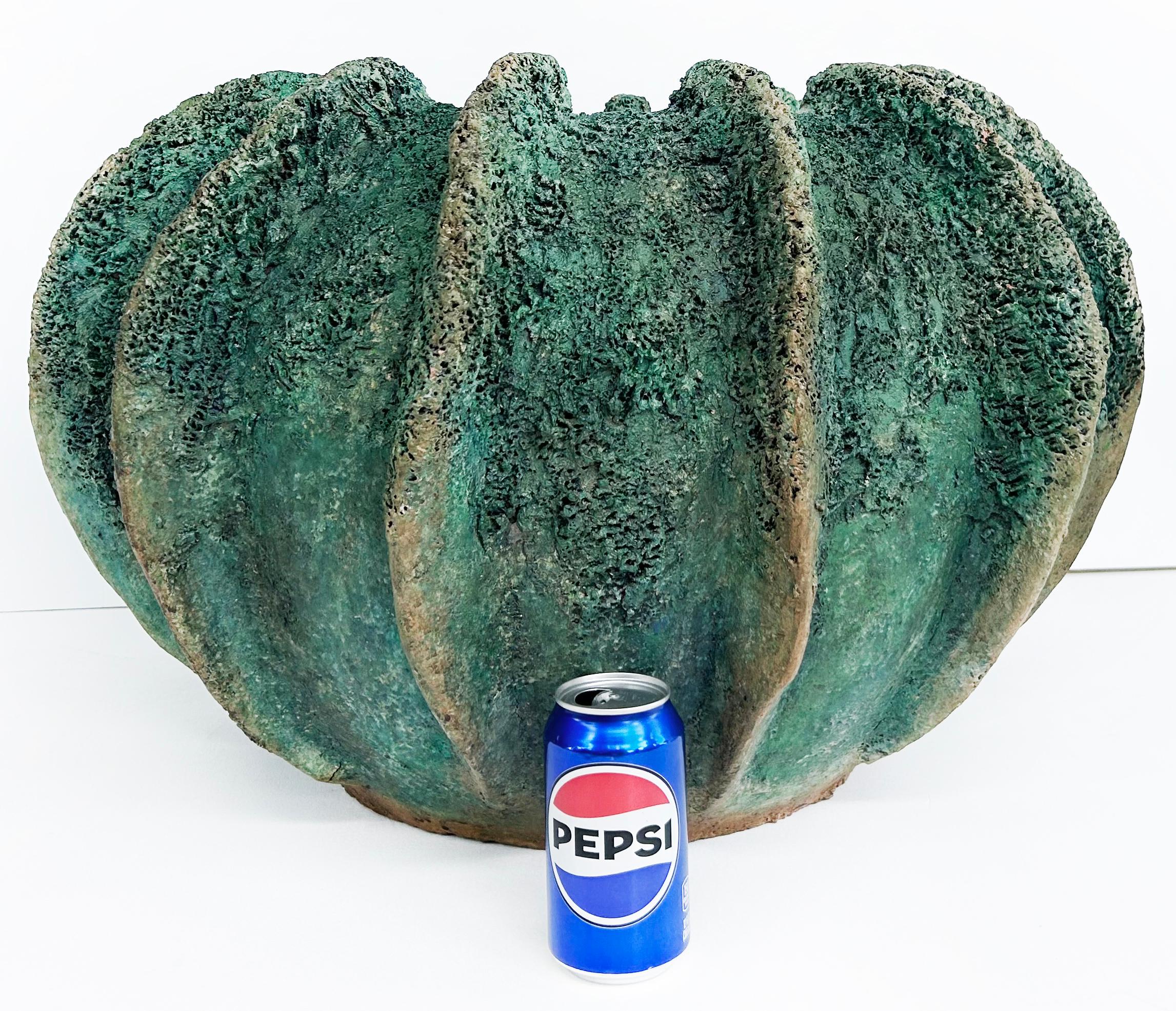 Large Balinese Teal Fluted Terracotta Planter

Offered for sale is a Balinese teal fluted terracotta planter.  The fins and textures create interest as does that wonderful teal finish. The diameter of the base is 13.5