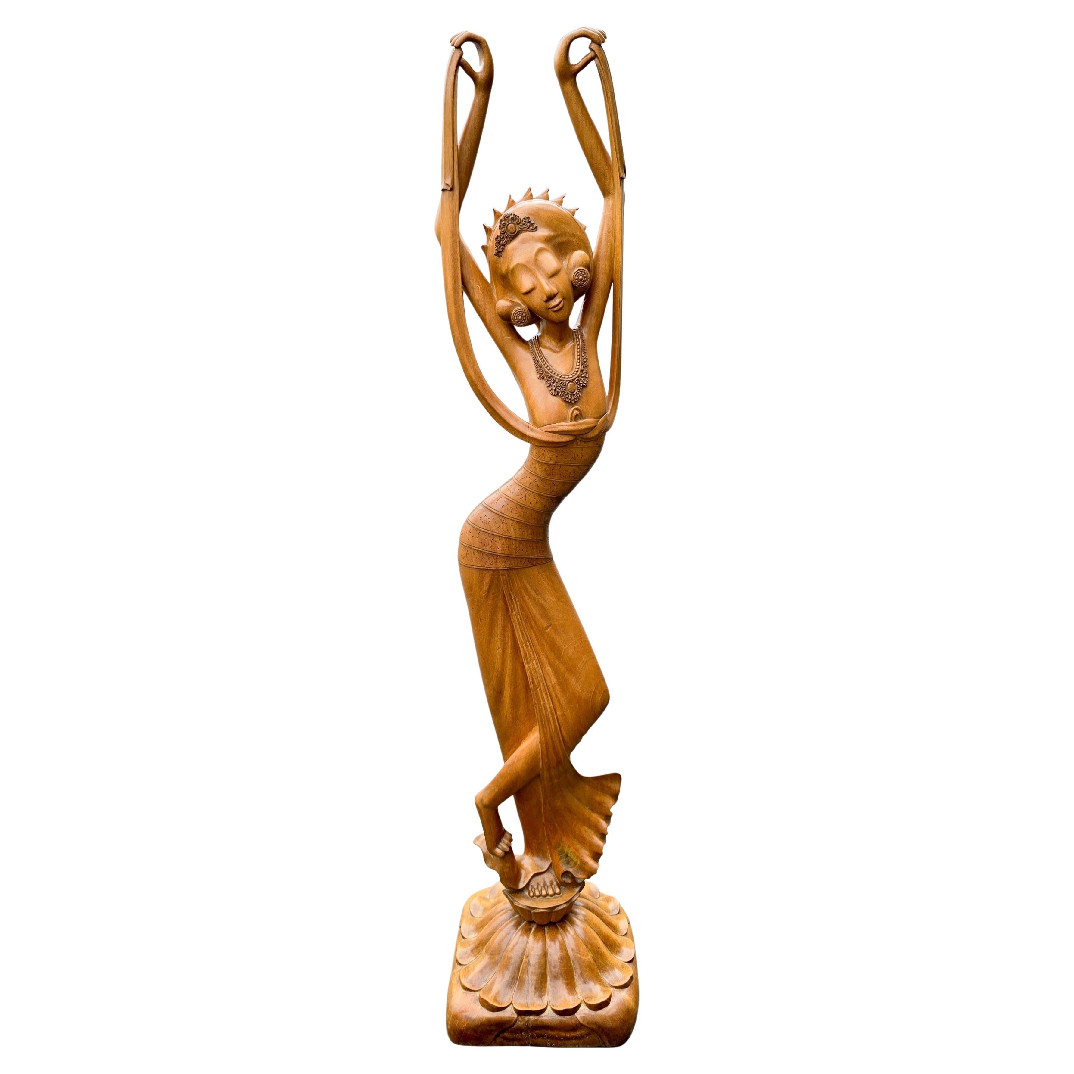 What wood is used for carving in Indonesia?