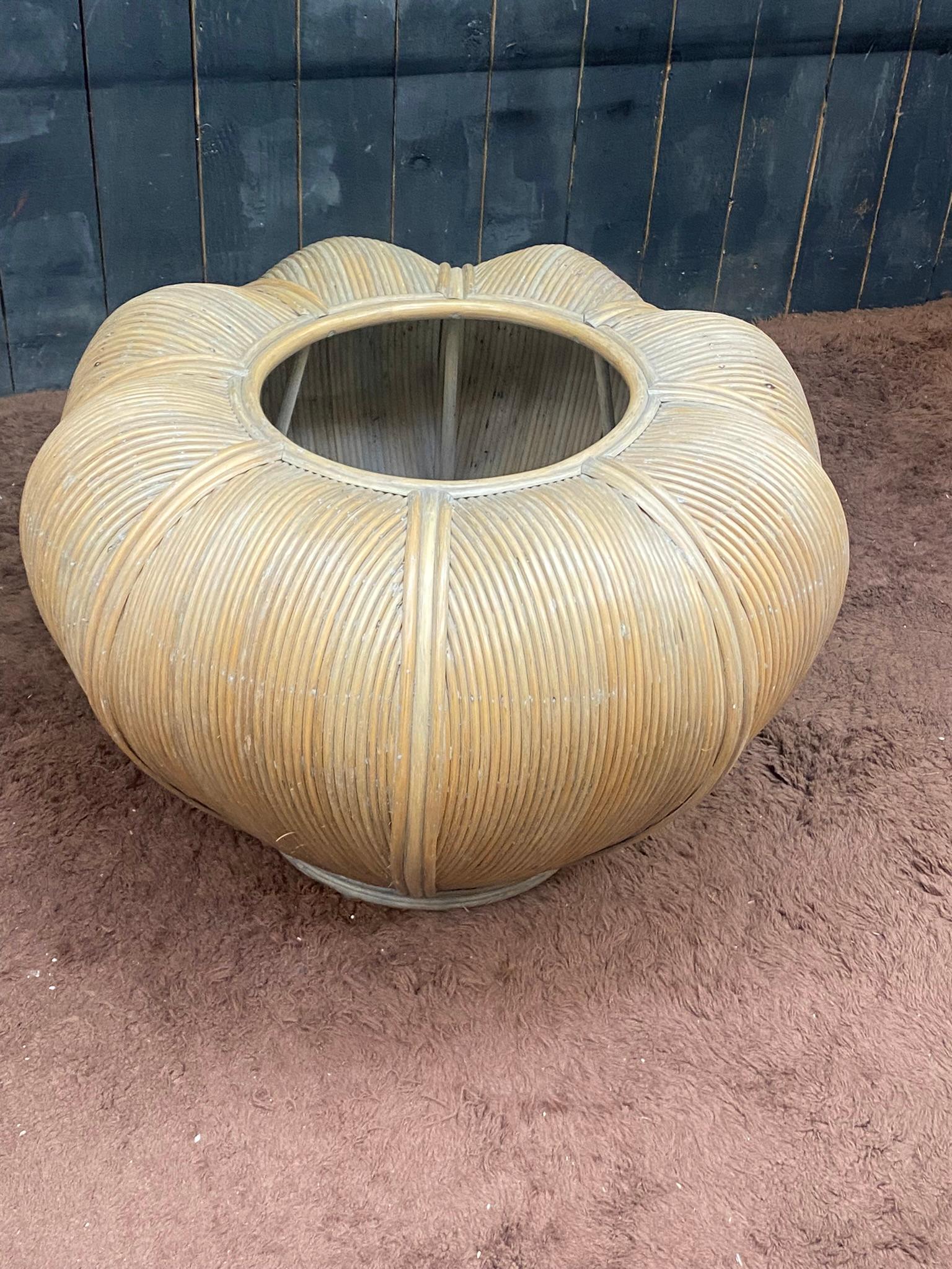 Large Bamboo and Rattan flowerpot , circa 1970
the flowerpot is tinted yellow


