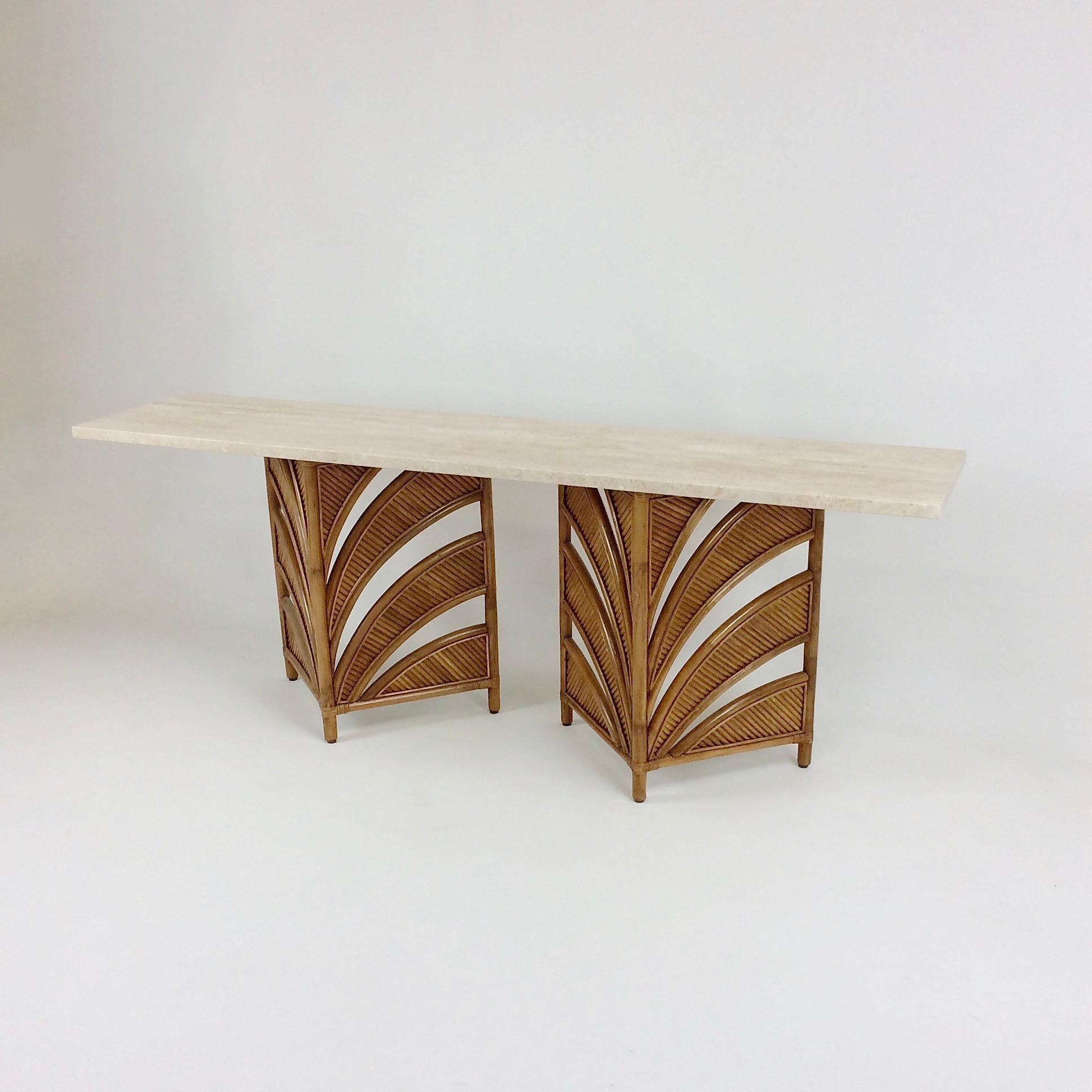 Elegant large console, design attributed to Vivai Del Sud, circa 1970, Italy.
Two independent bamboo and rattan feet, travertine top.
Dimensions: 200 cm W, 45 cm D, 75 cm H.
Good original condition.
All purchases are covered by our Buyer