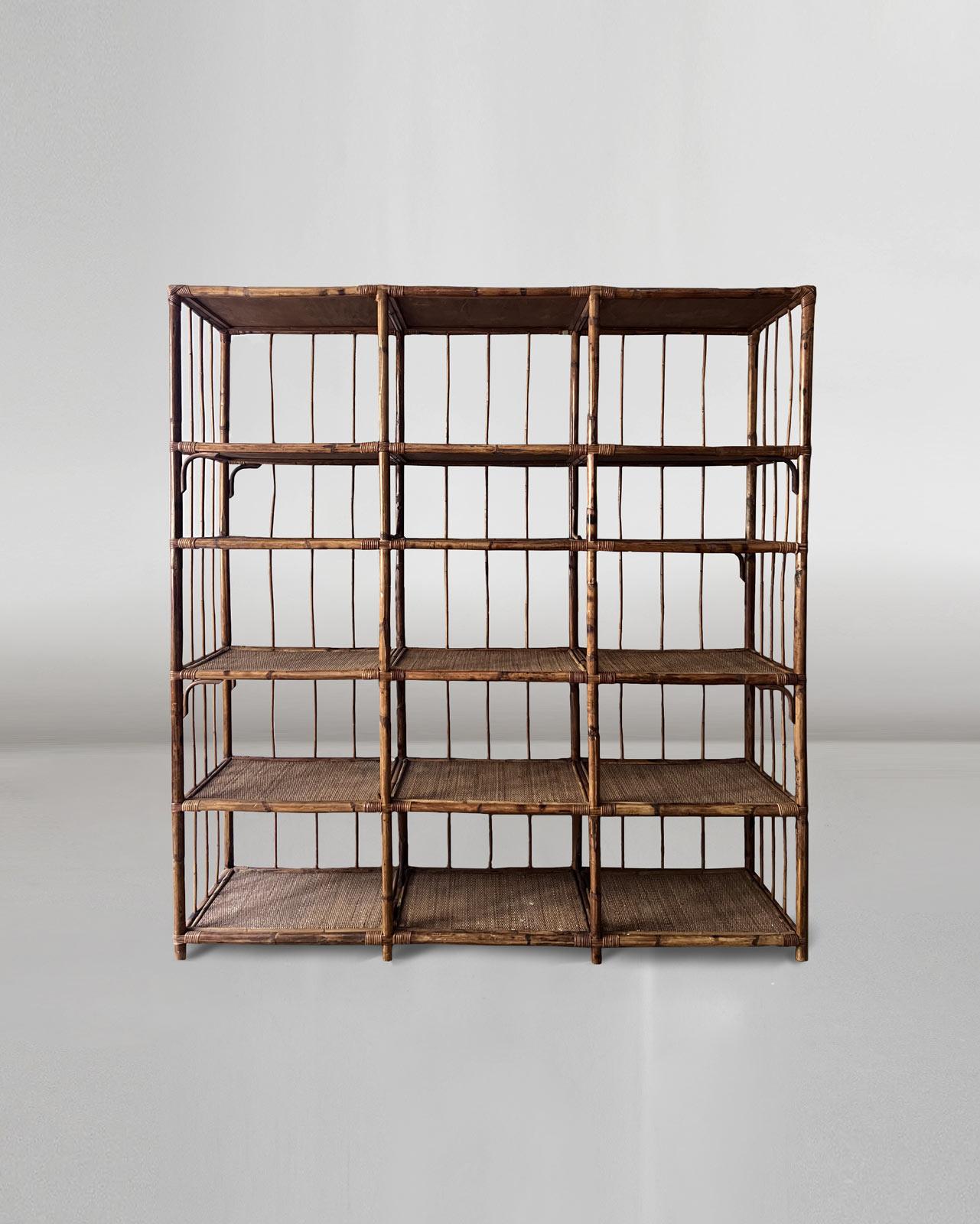 Large bamboo and wicker bookcase from 1950
Bookcase dimensions: 200W x 210H x 45D cm
Materials: bamboo, wicker.
Production: Italian artisan production 1950