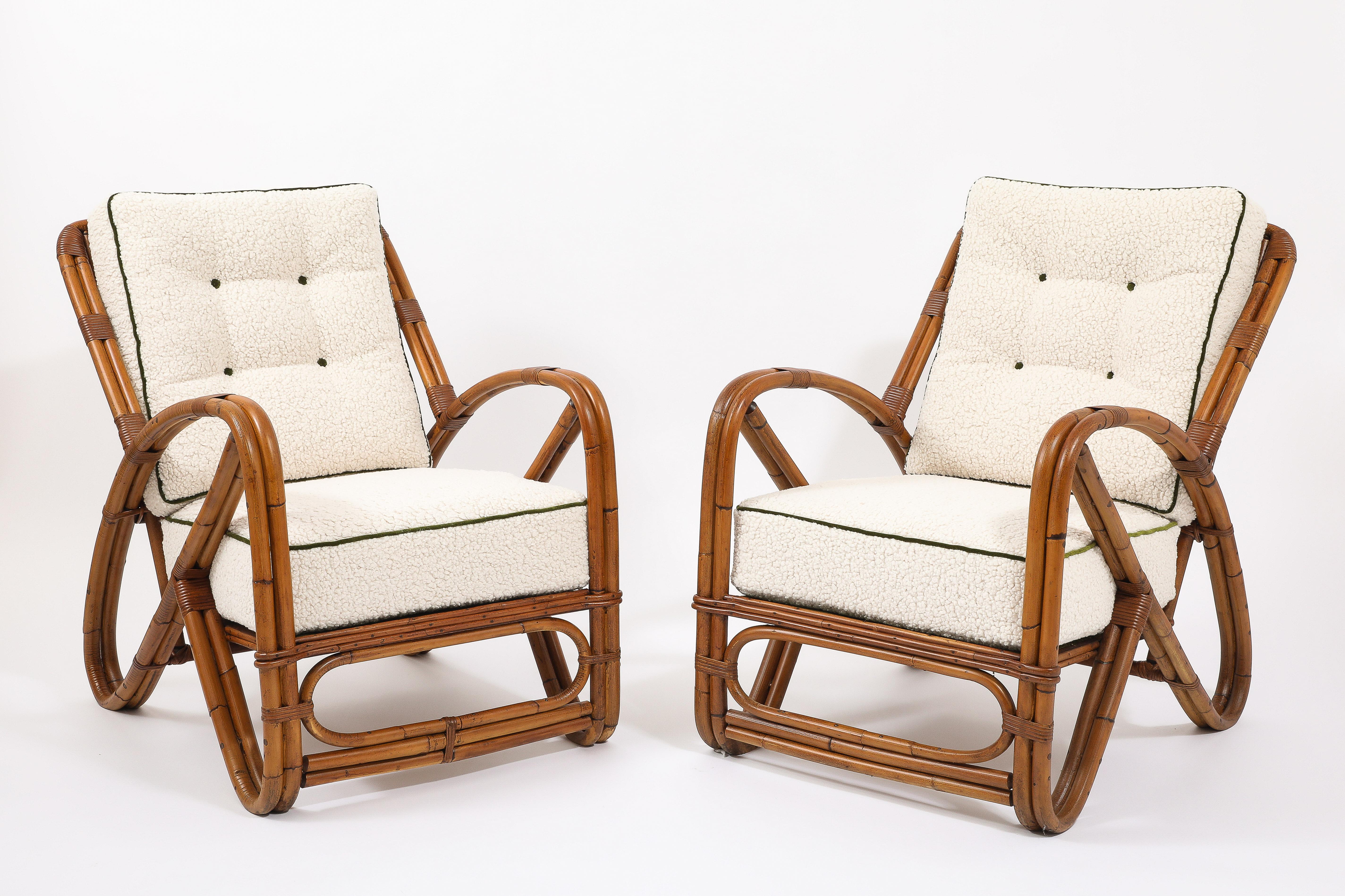 A pair of curvaceous bamboo loungers newly upholstered in faux shearling, refinished in a rich pecan tone.