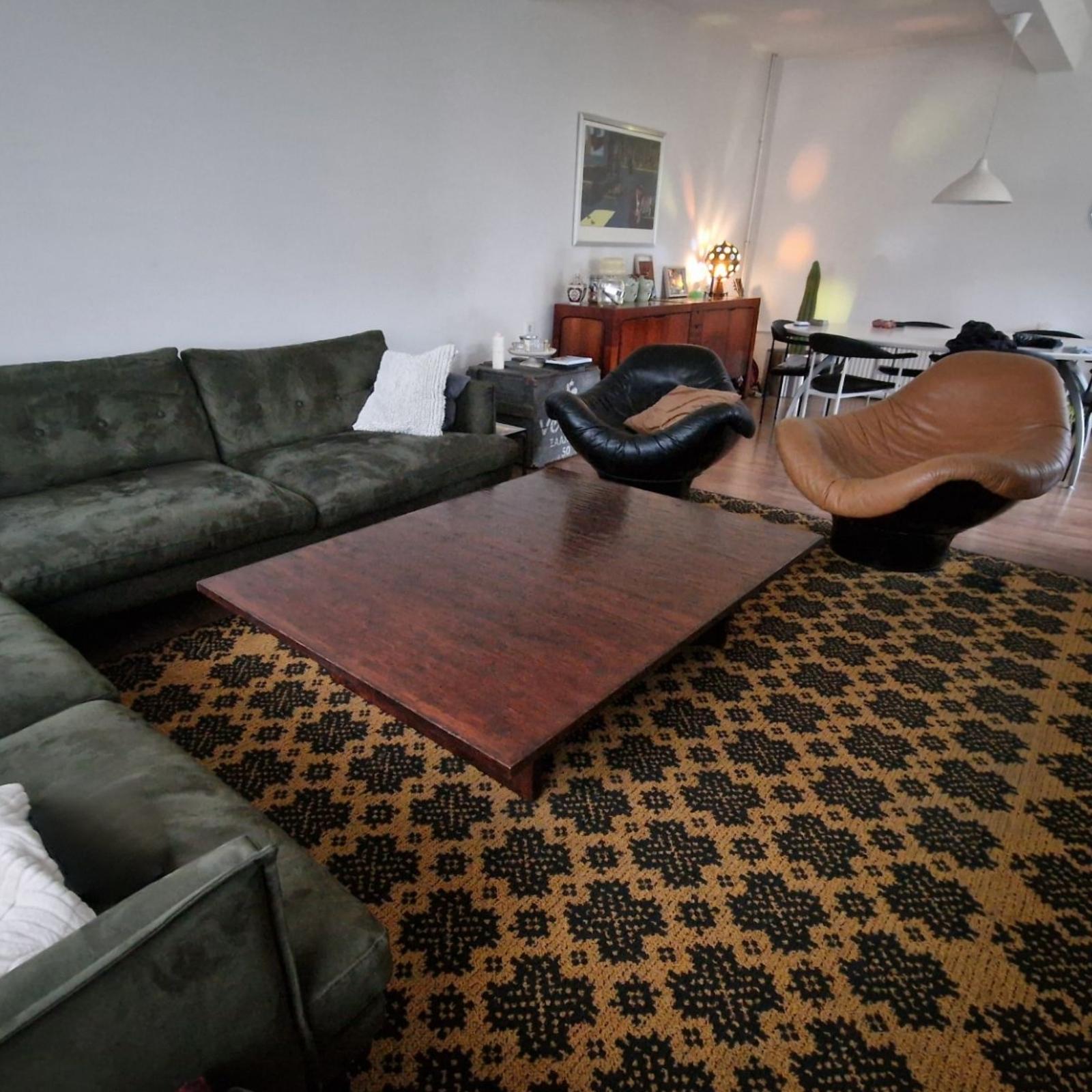 Wabi sabi wood and bamboo coffee table. Designed by Belgian interior decorator Axel Vervoordt. Handcrafted in the 1980s. The top is made from slats of solid wood with a bamboo surface. The base is a simple yet sturdy construction of solid wood