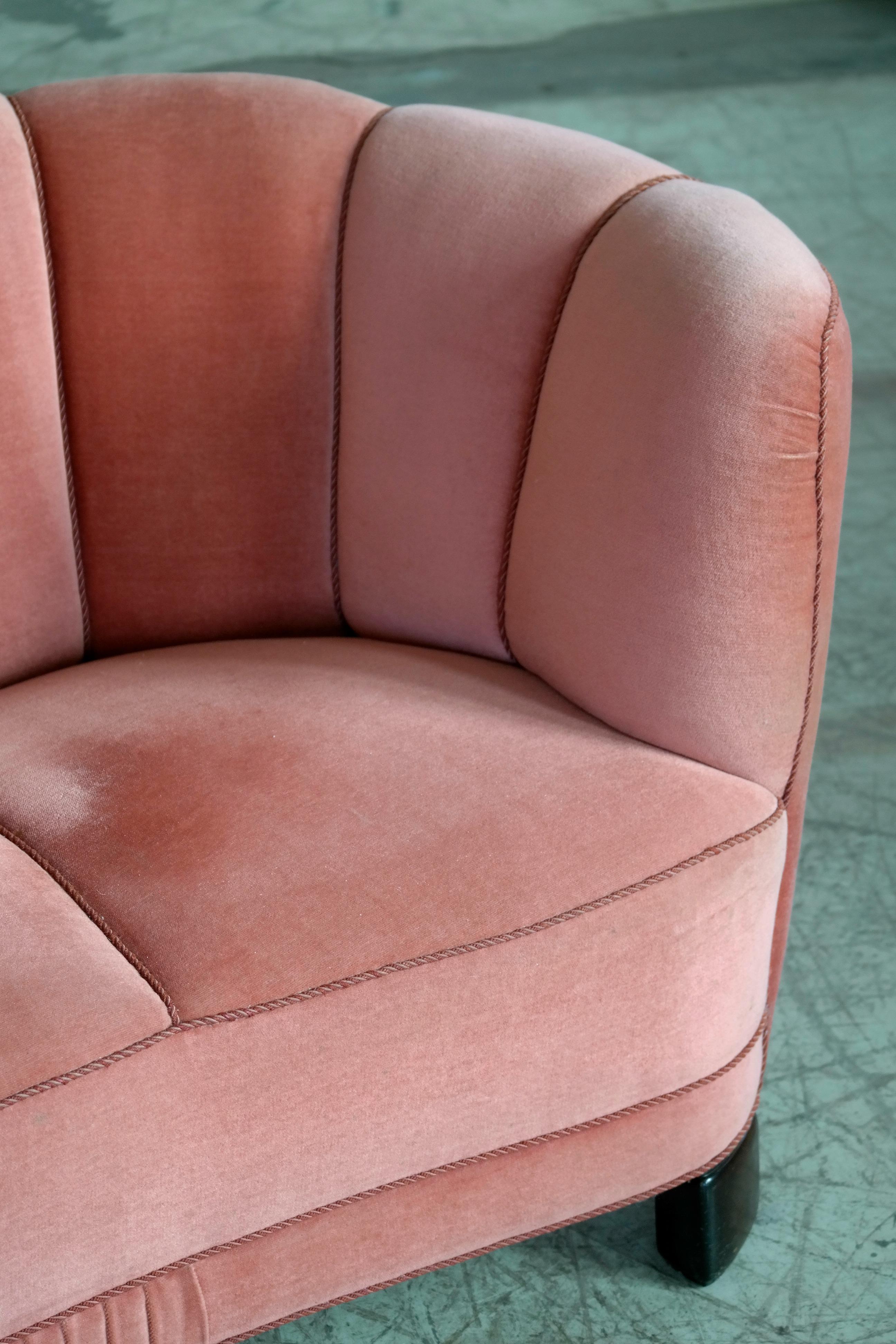 curved pink sofa