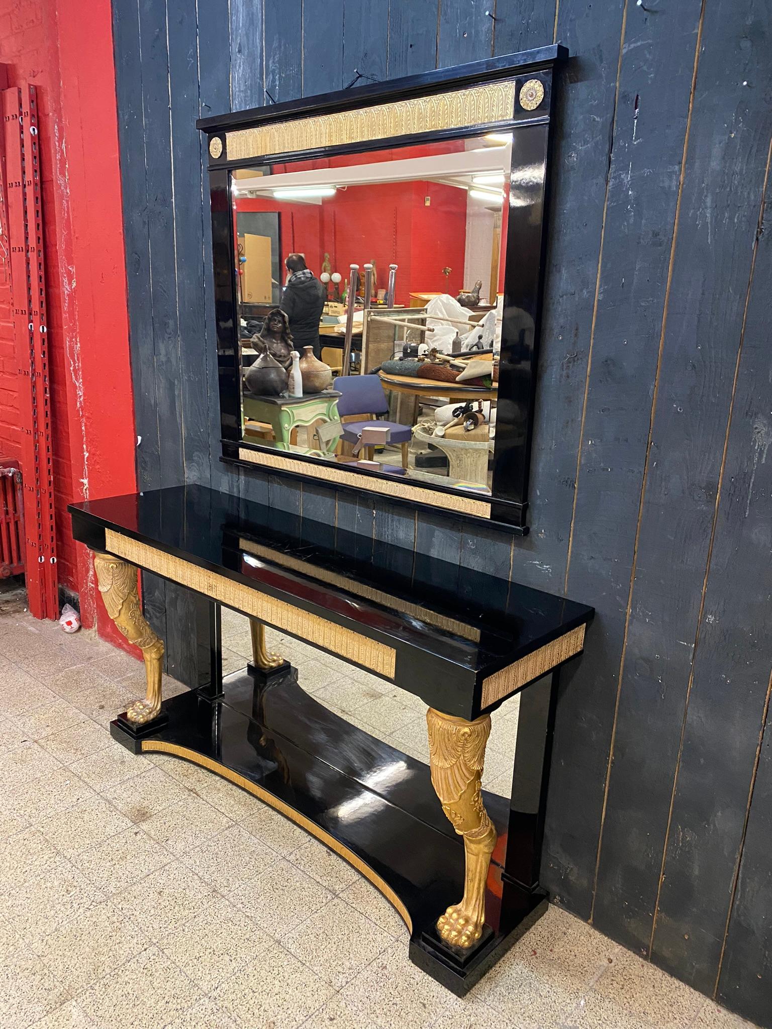 Gilt large baroque console and its mirror circa 1950/1960 For Sale