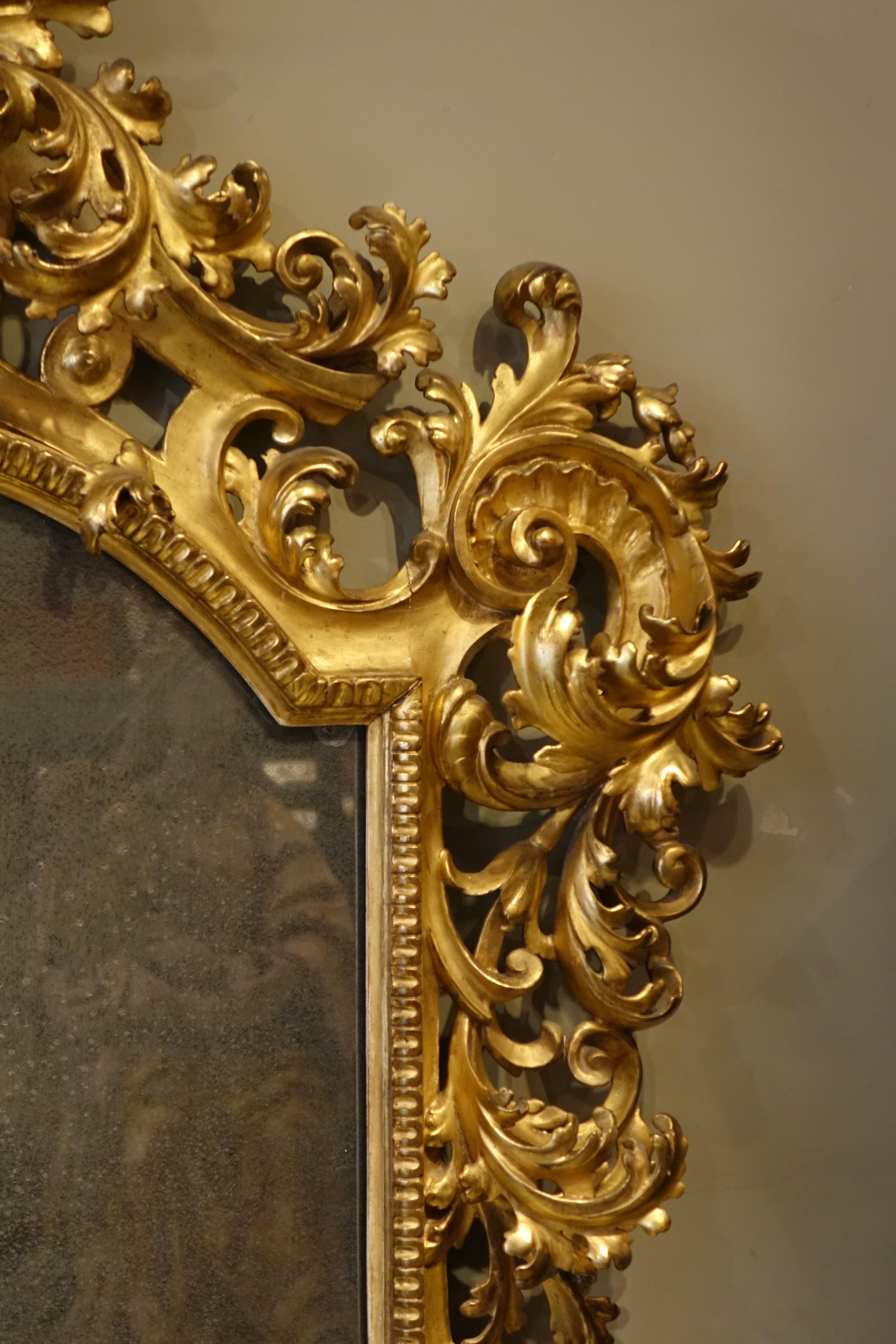 Baroque Large baroque mirror in carved and gilded wood, Italy 19th century For Sale