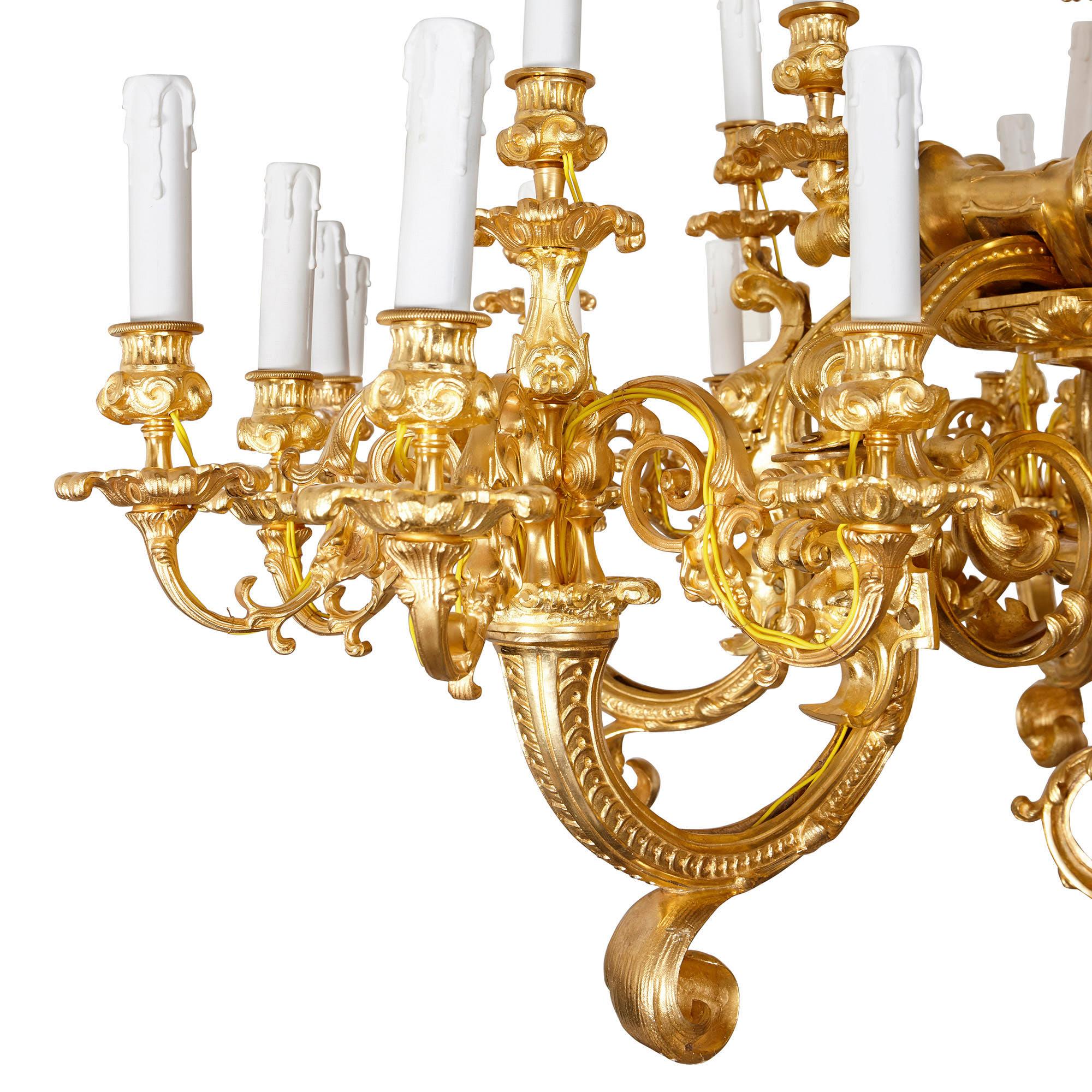 This impressive, eighteen-light chandelier—which measures 1.7 metres (67 inches) in height—will bring grandeur and majesty to a room. It is crafted in a bold Baroque style, which was typical of decorative arts produced in France during the reign of