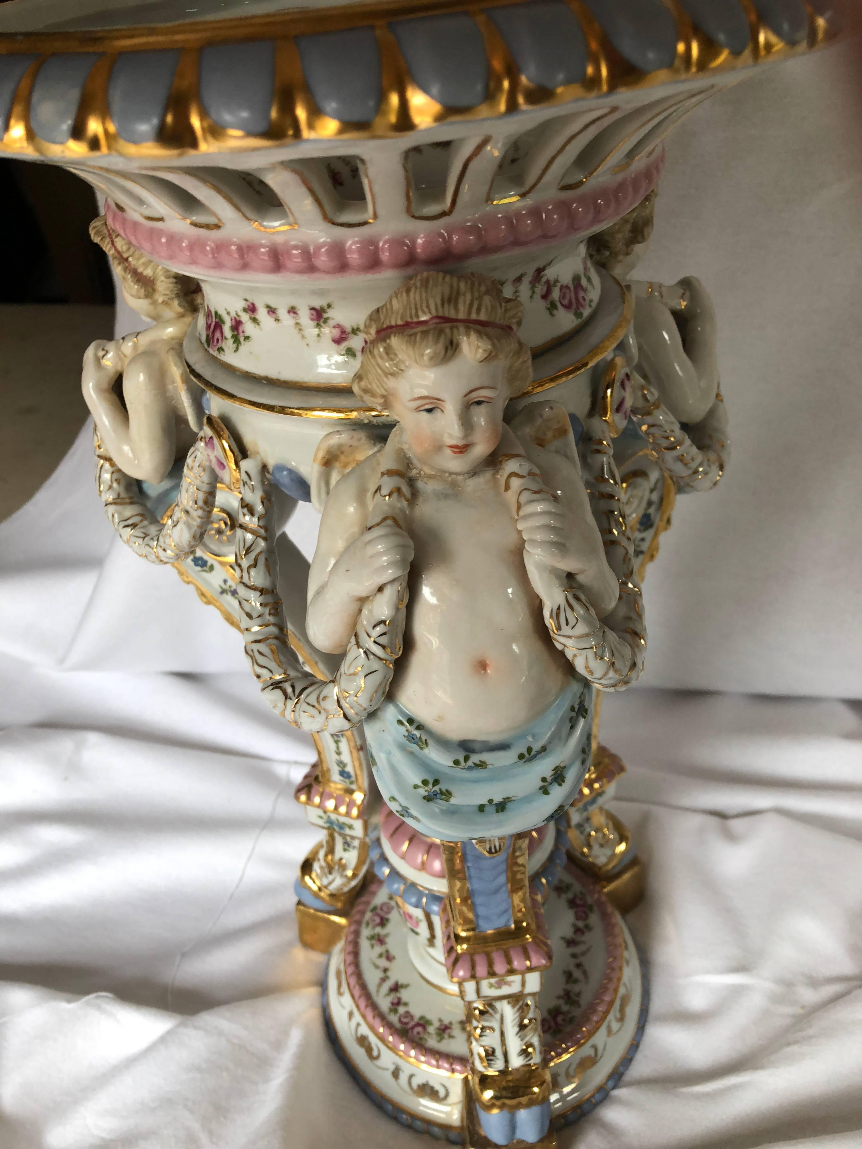 Early 20th Century Large Baroque Style Porcelain Centerpiece, Large Hand-Painted Cherub Epergne For Sale