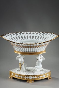 Large Basket in Paris Porcelain resting on two cupids