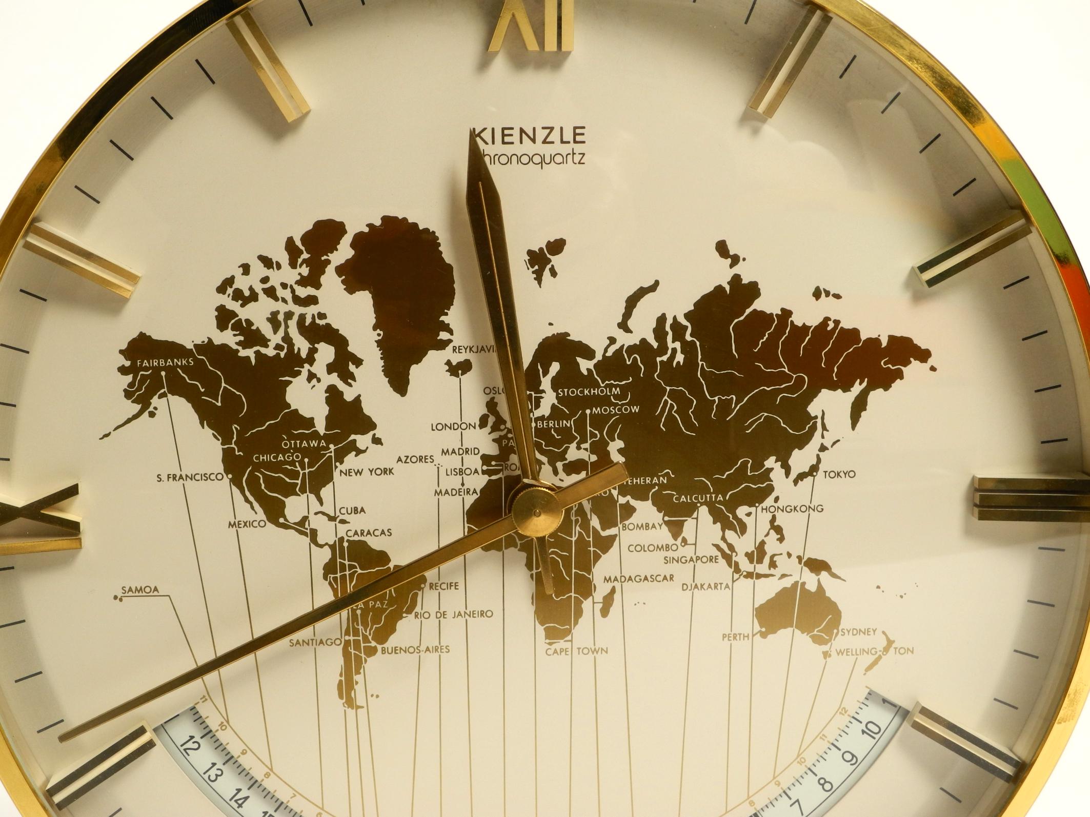 Brass Large battery-operated brass world clock Heinrich Möller for Kienzle from 1978 For Sale