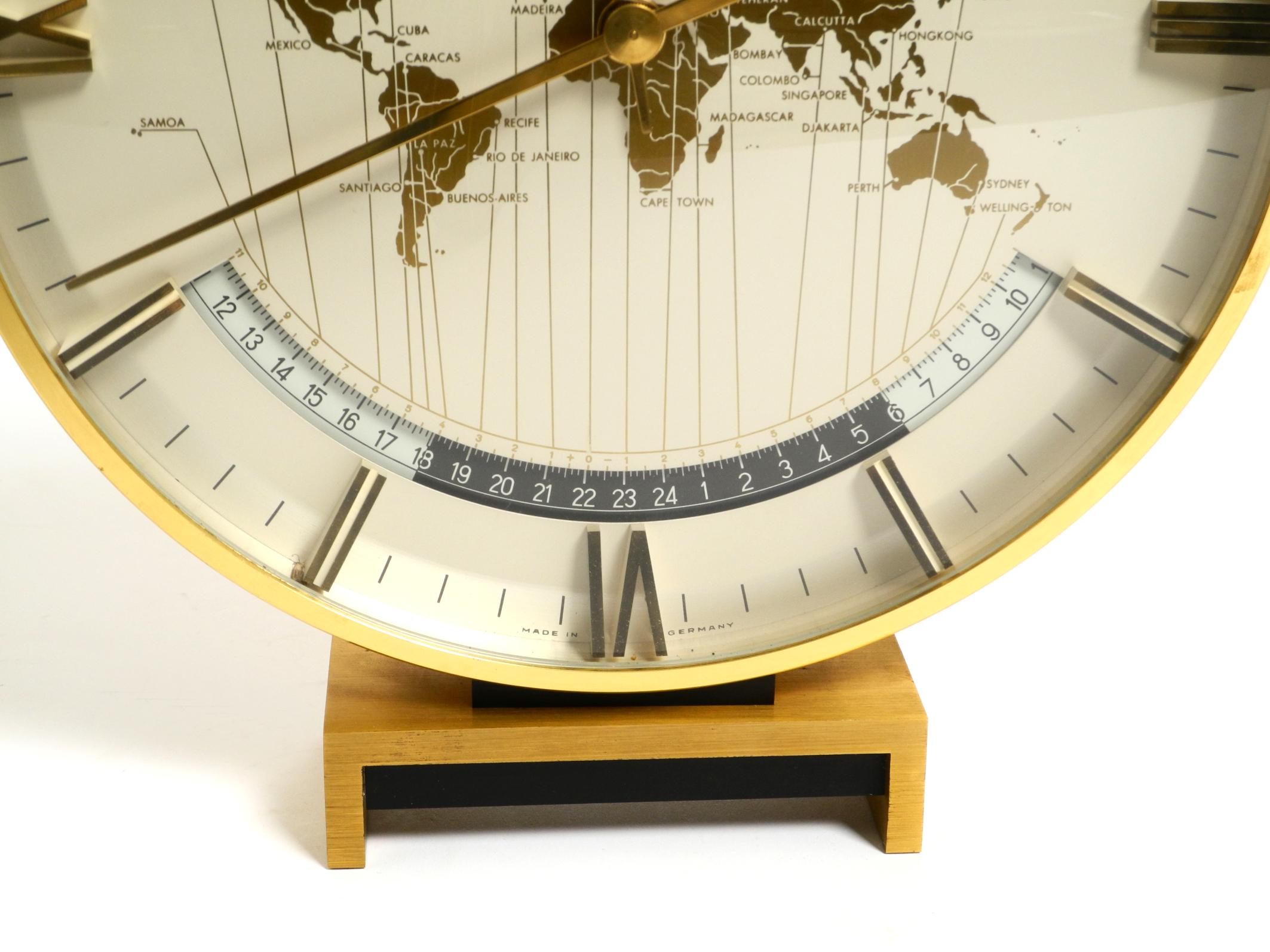 Large battery-operated brass world clock Heinrich Möller for Kienzle from 1978 For Sale 1