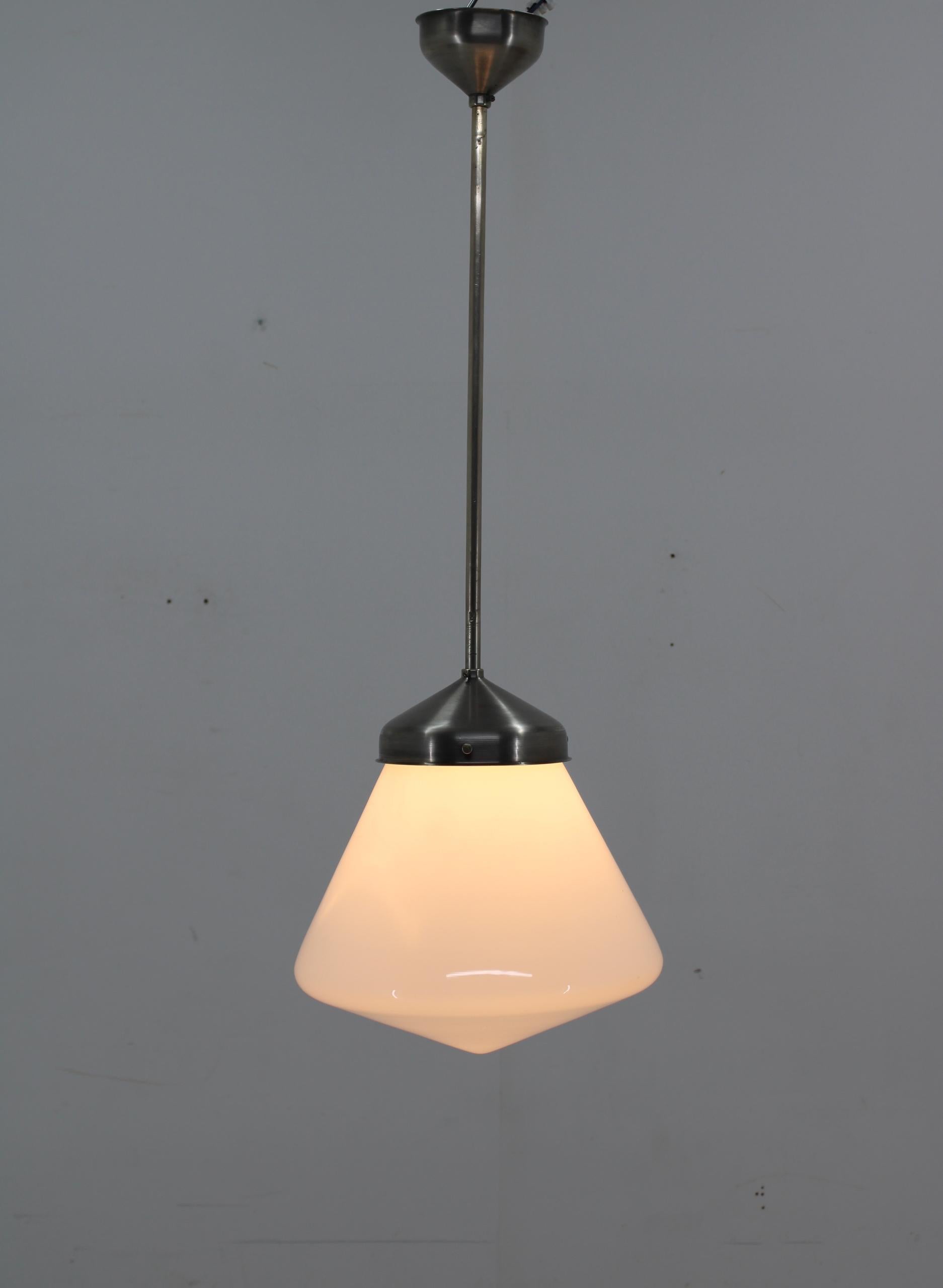 Adjustable height - min height 75cm, max height - 85cm.
Very good original condition.
Few scratches on glass shade visible on pictures.
Cleaned, rewired: 1x60W, E25-E27 bulb
US wiring compatible