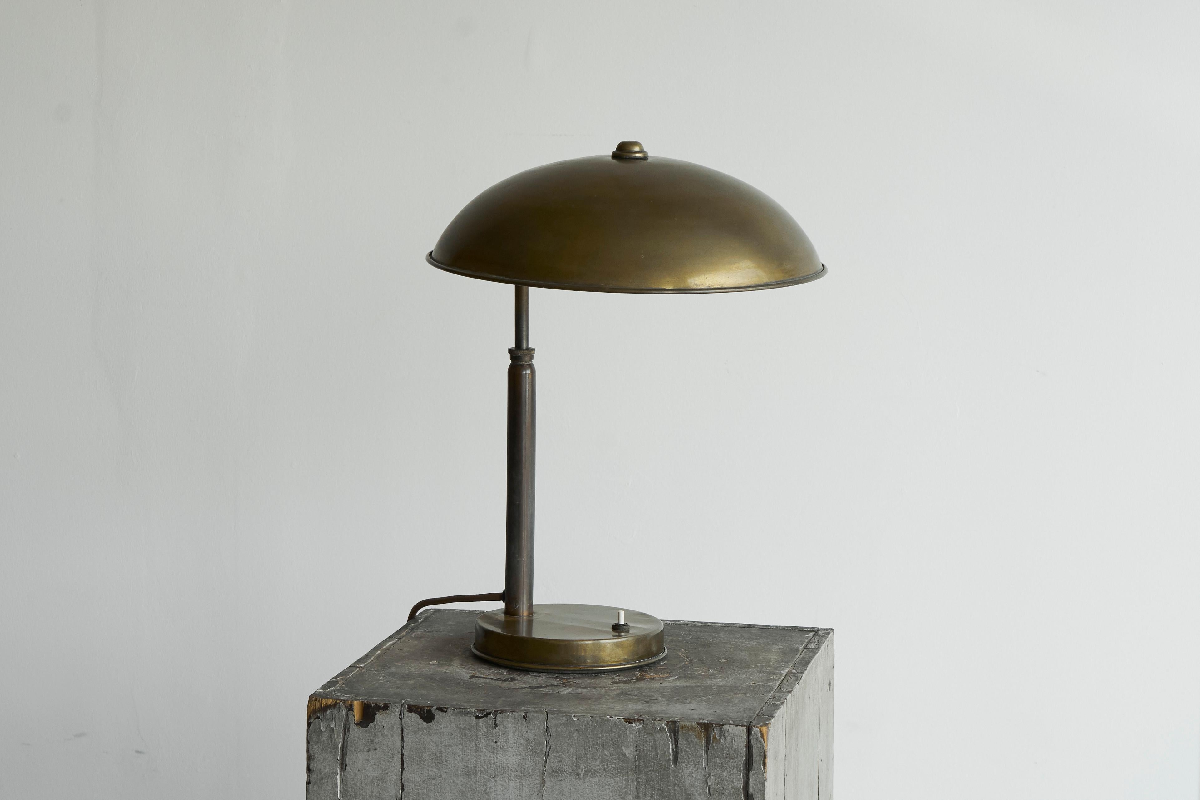Large Bauhaus Style Table Lamp in Patinated Brass 1930s

A large modernist Bauhaus style table or desk lamp in patinated brass. Europe, 1930s.

Wonderful and timeless Bauhaus inspired design - great proportions with nice details but without much
