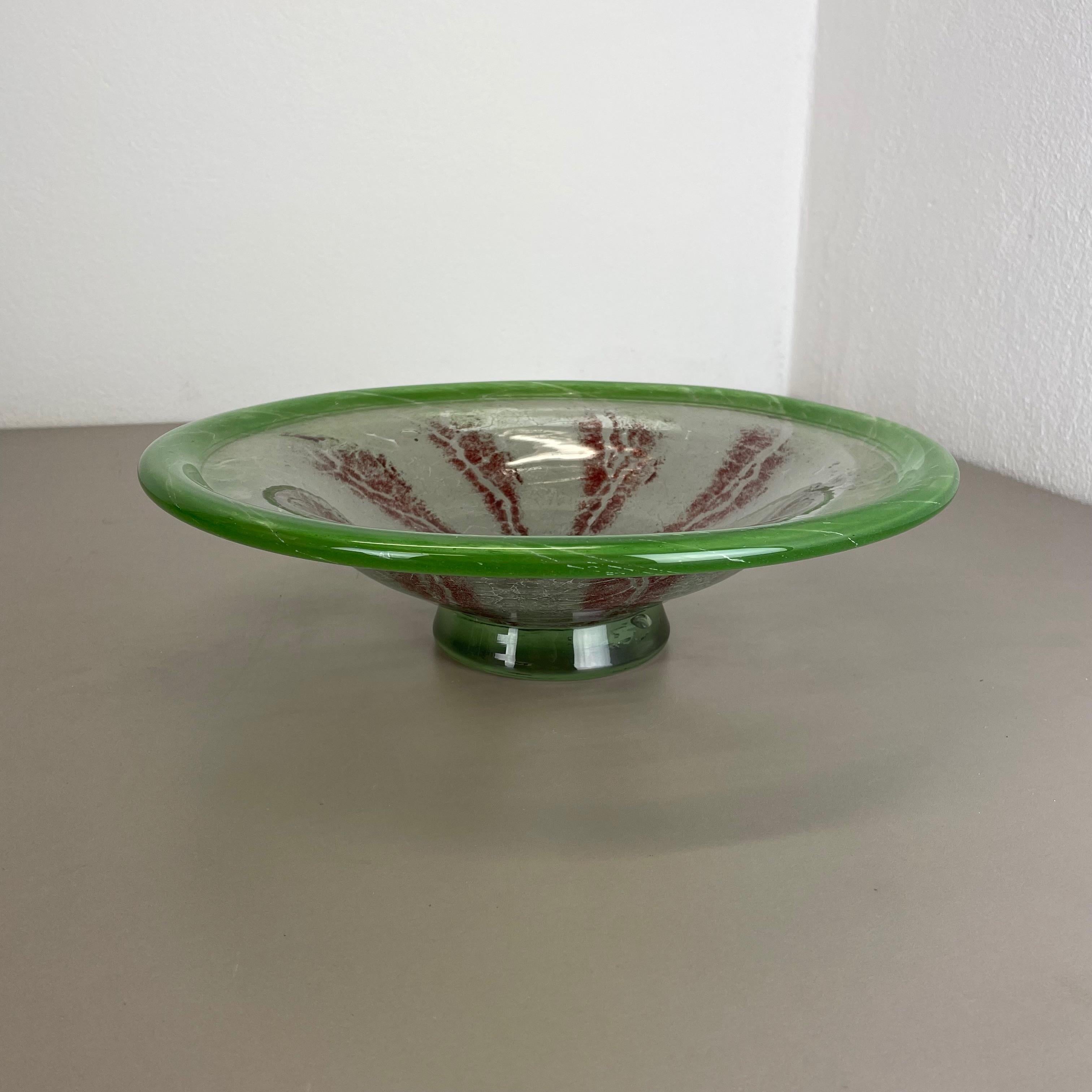 Article: Glass bowl



Producer: WMF, Germany 



Designer: Karl Wiedmann 


Age: 1930s



Description: 

Wonderful heavy Art Deco glass element designed by Karl Wiedmann and produced WMF, Germany in the 1930s. This glass bowl is