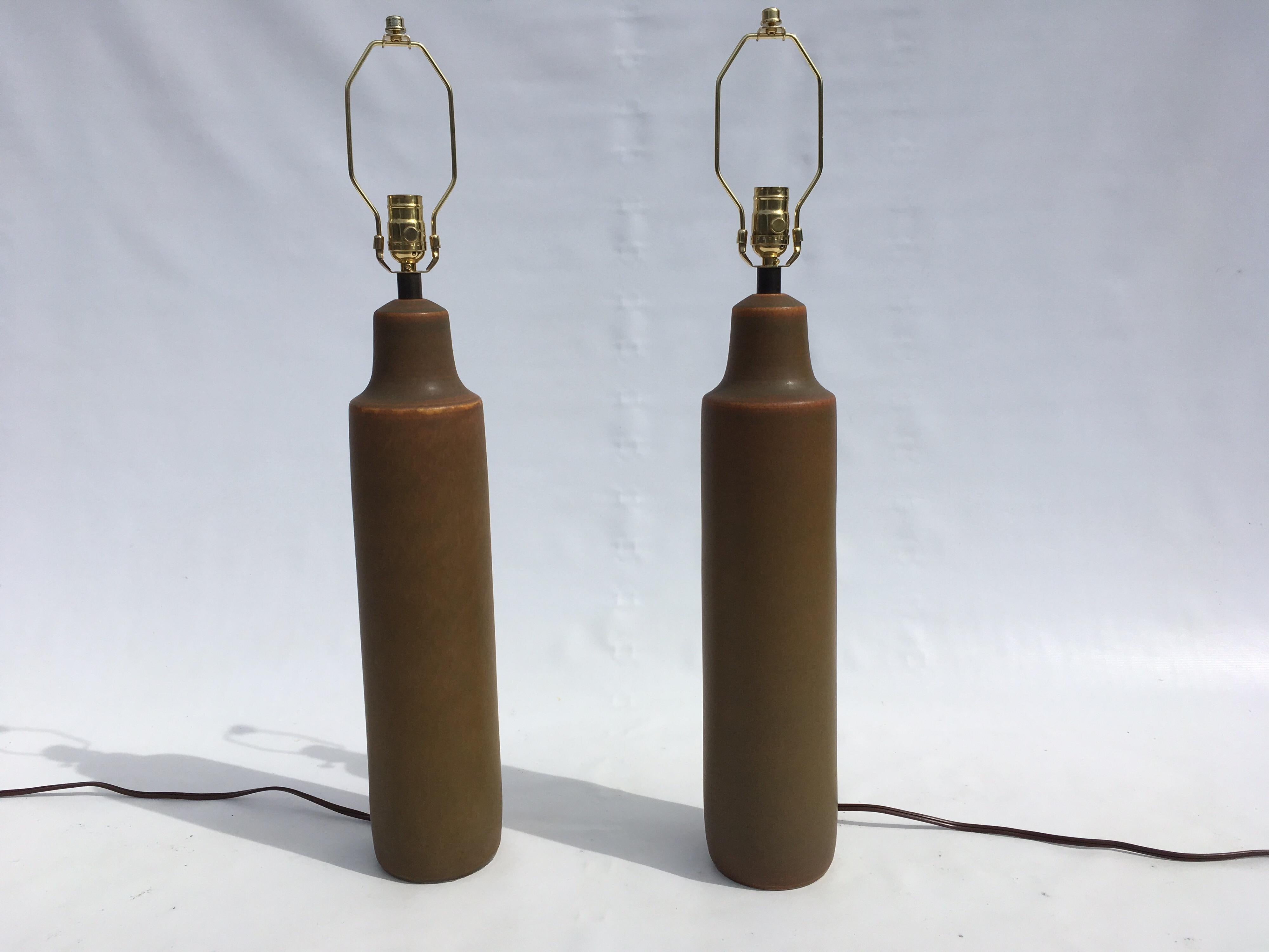 Stunning large original midcentury ceramic lamps, olive green color with different shades of orange and yellow. Please see all pictures. Shades are fairly new.