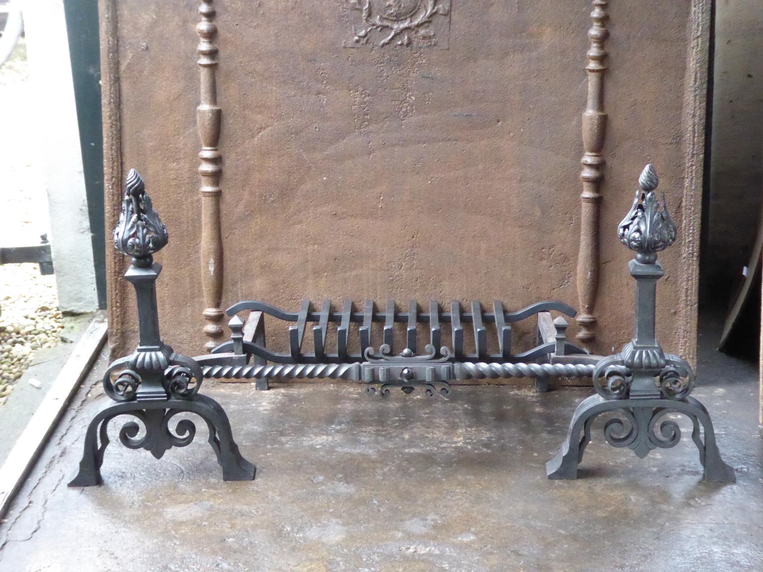 Beautifully forged Belgian Art Nouveau fireplace basket or fire basket. The fireplace grate is made of wrought iron. It is made late 19th or early 20th century. The condition is good.

















  