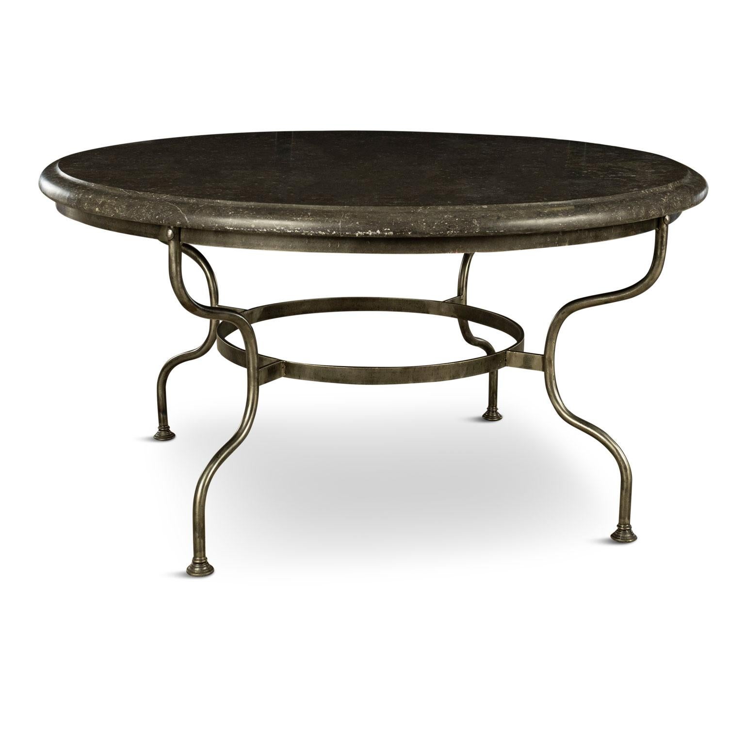 Large Belgian bluestone steel table: round two inch thick bluestone ogee-edge top raised upon a custom steel base.