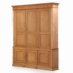 Large Belgian paneled oak wall cabinet, C. 1890.