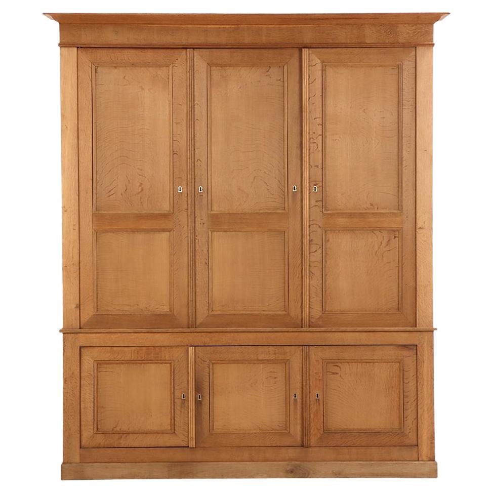 Large Belgian paneled oak wall cabinet, C. 1890. For Sale