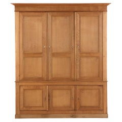 Antique Large Belgian paneled oak wall cabinet, C. 1890.