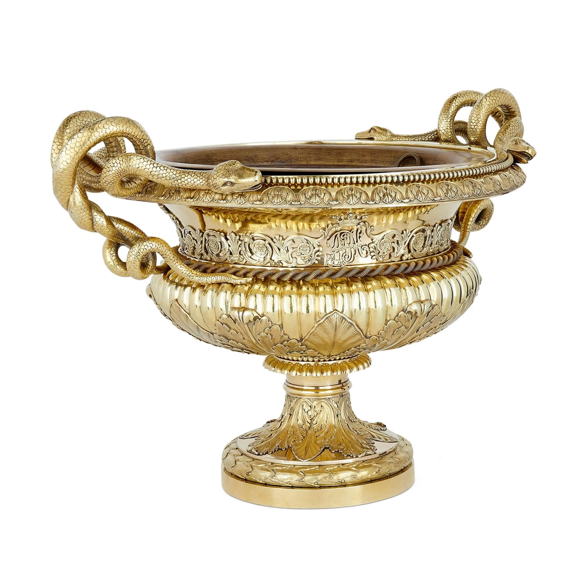 Large Belgian silver gilt vase, 19th century 
Belgian, 19th Century
Height 36cm, width 52cm, depth 39cm

This superb vase is crafted from shining silver gilt. Of rounded campagna form, the composition is richly decorated with applied foliate