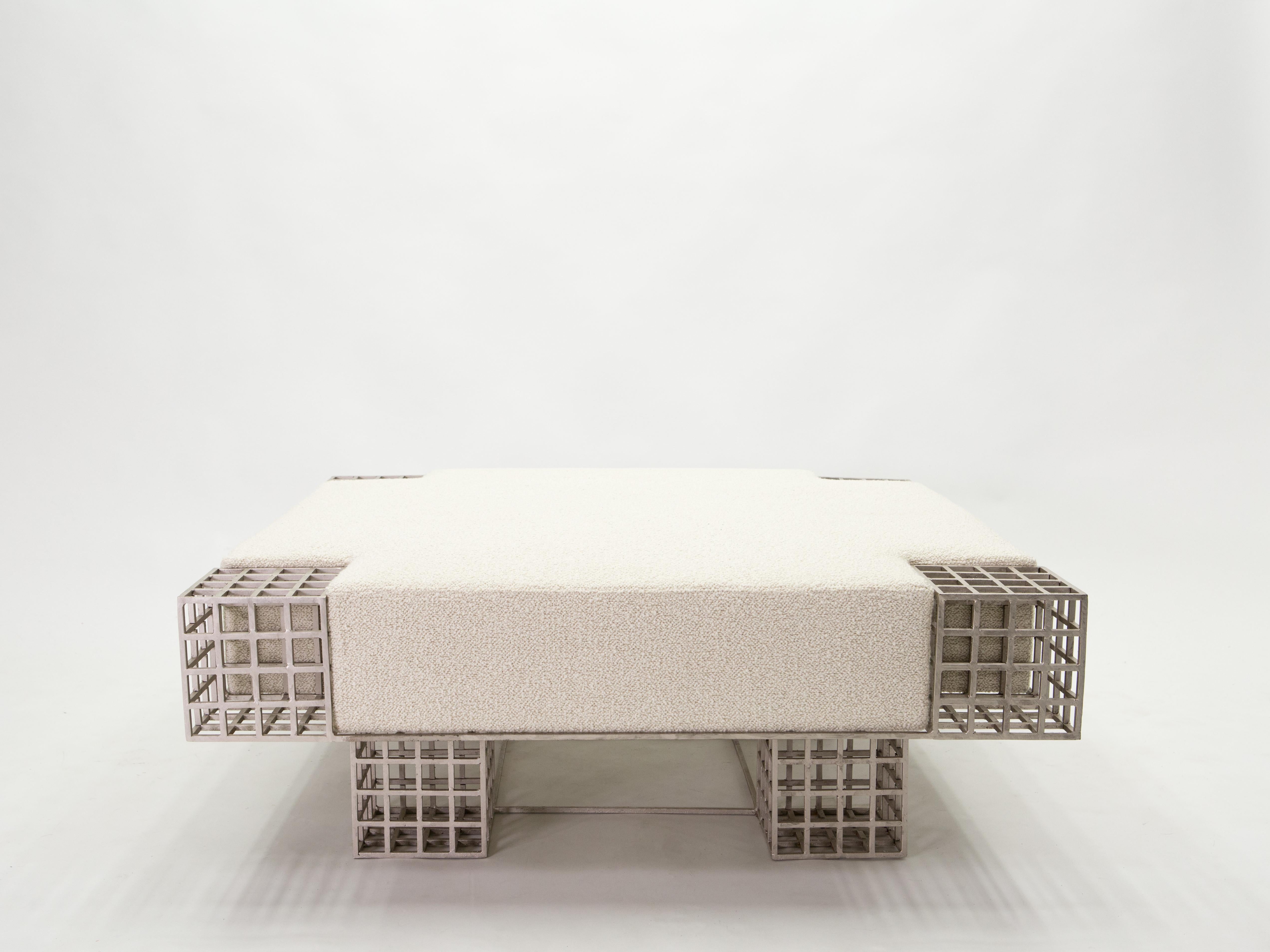 This is a very rare and unique Italian bench ottoman designed by Carla Sozzani for her gallery in Milano in the late 1990s. With strong architectural lines, the handmade steel structure is a work of art. It has been fully restored, and newly