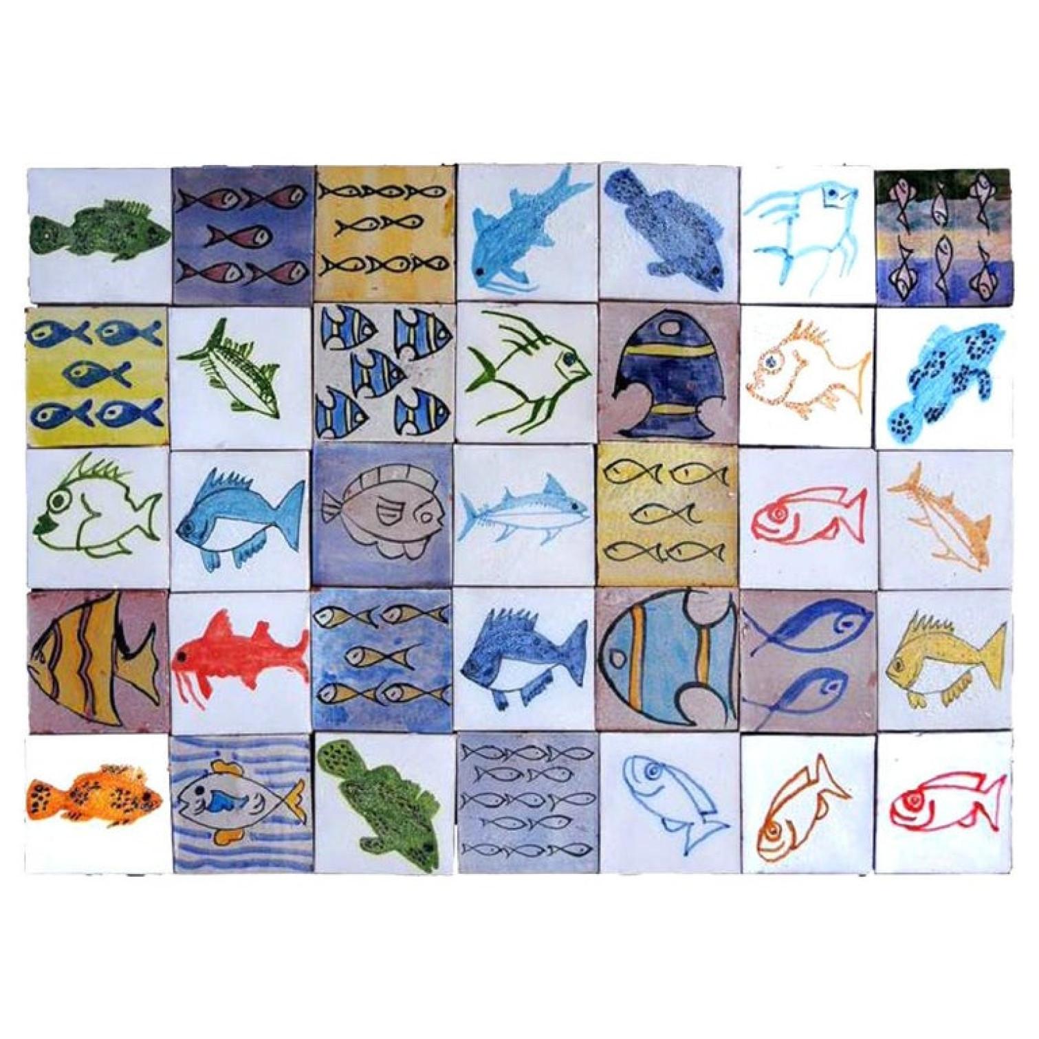 A unique patchwork composition panel. The fun and colorful hand painted panel consists of 35 moroccan tiles. All tiles show sketches and drawings of fish in the style of the Berber culture. Each of them are unique.

The Berbers (or Amazigh) are the