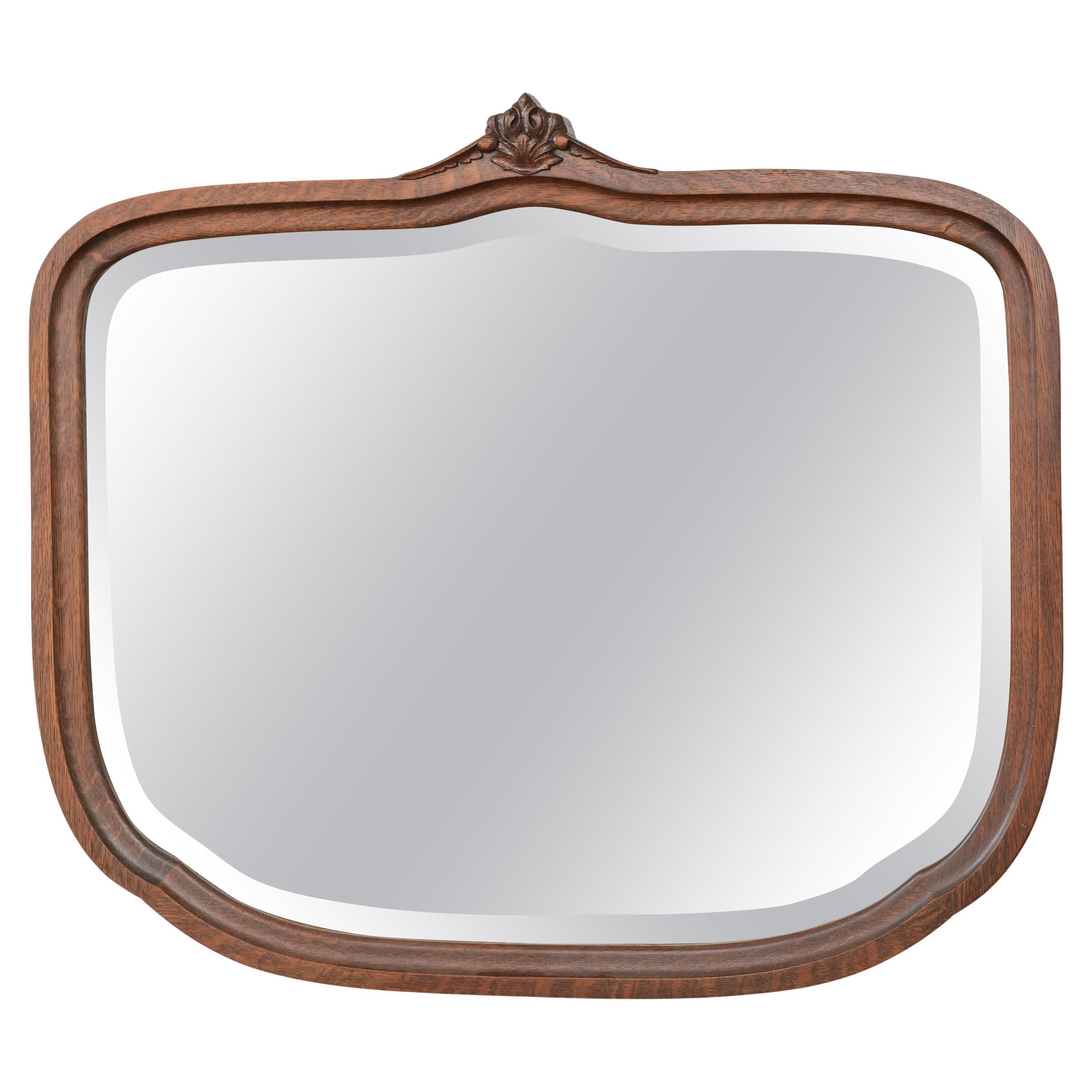 Large Beveled Glass Shield Shaped Mirror in Oak Frame, American ca. 1900