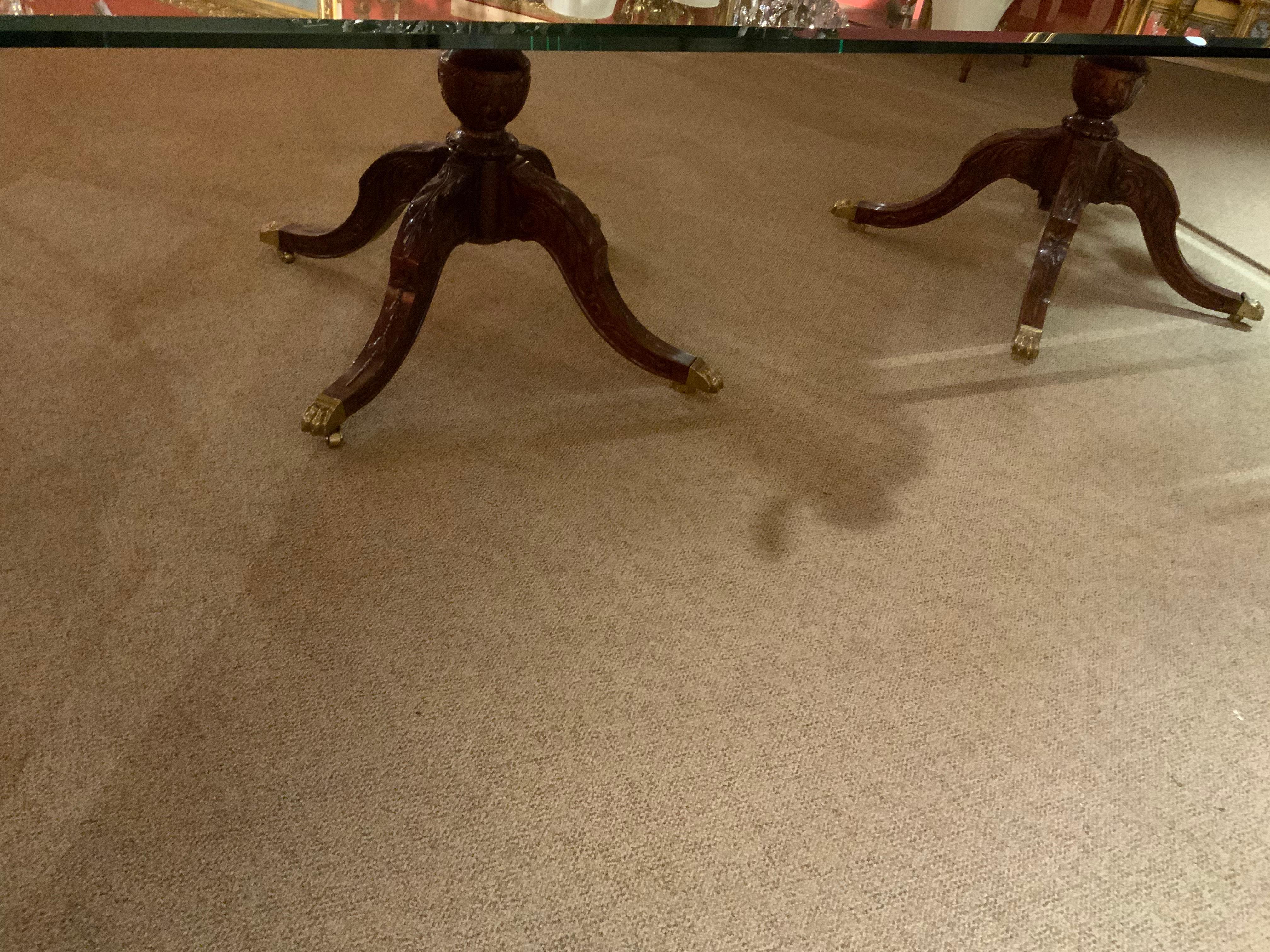 Large Beveled Glass Top Dining Table on Double Mahogany Carved Bases In Excellent Condition In Houston, TX