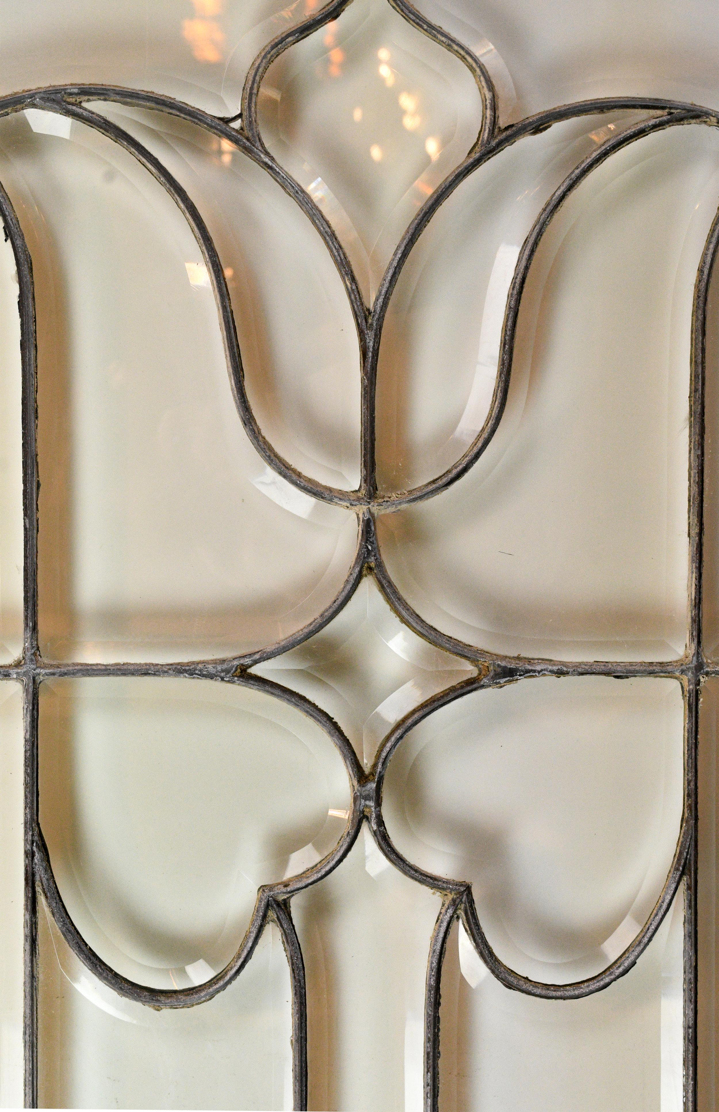 Large beveled glass window with a simple and elegant pattern throughout. Complete with wood frame,

circa 1900
Condition: Good 
Finish: Original