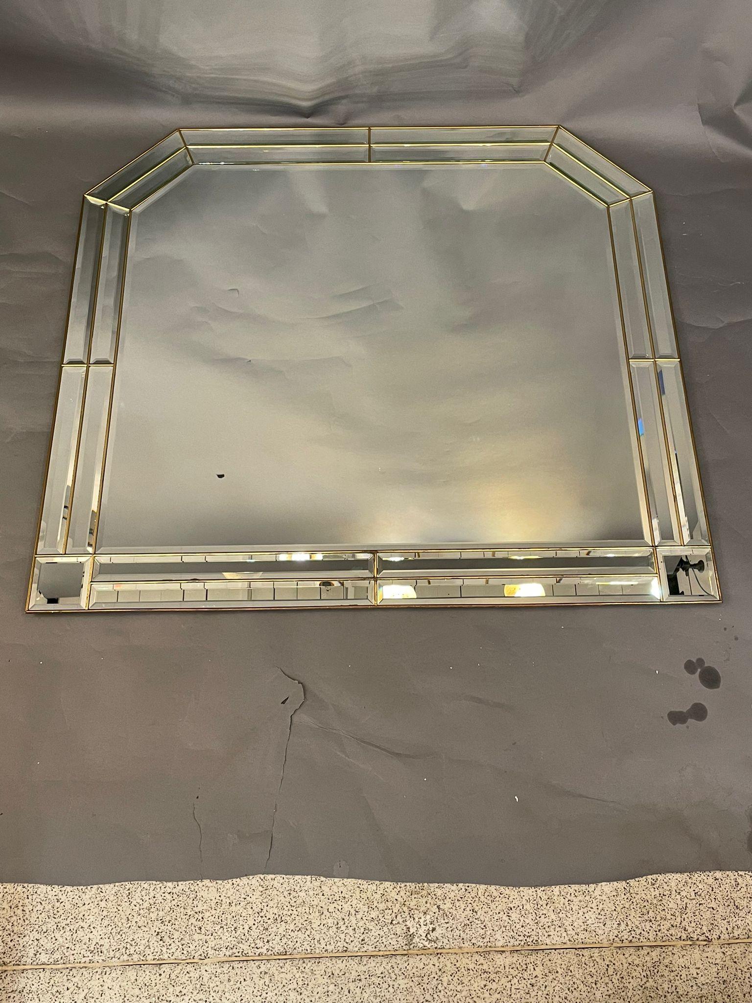 Large bevelled mirror. This great Mid-Century Modern mirror would look great over a console table, commode, credenza, buffet or above a fireplace mantel.