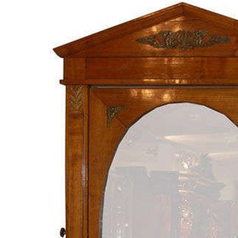 Large Biedermeier adjustable walnut standing mirror with brass fittings.