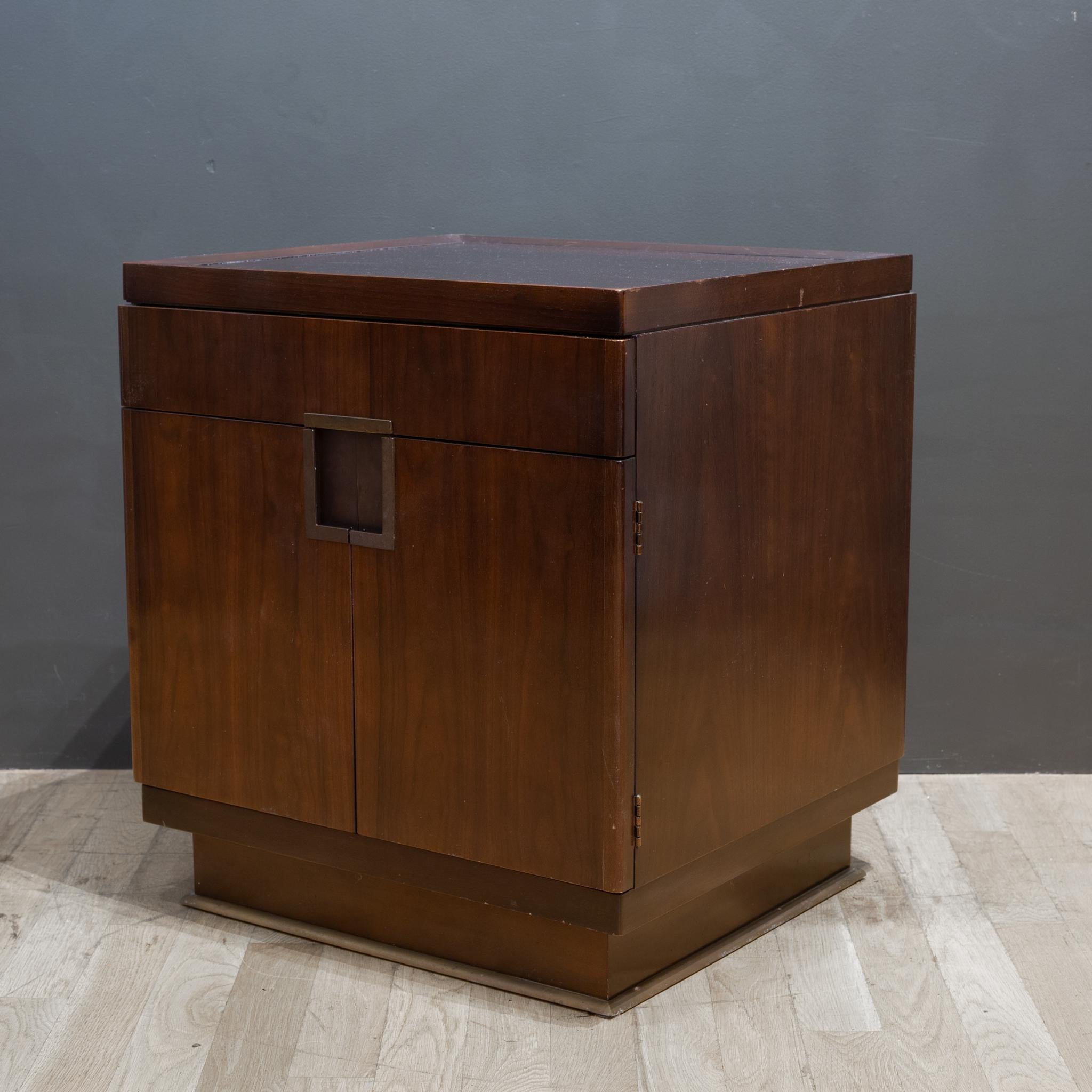 Large Mahogany nightstand with two doors, one large drawer and single shelf.
Metal accent handles and bottom trim. 
Designed by Bill Sofield for Baker Furniture.

Contact us for more shipping options: S16 Home San Francisco.

 