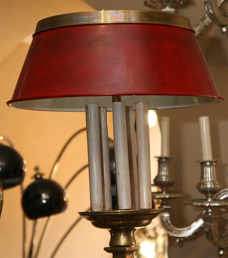 A large circa 1940s English billiard table light fixture of cast bronze and with painted tole shades and 15 lights.

Measurements:
Height: 54