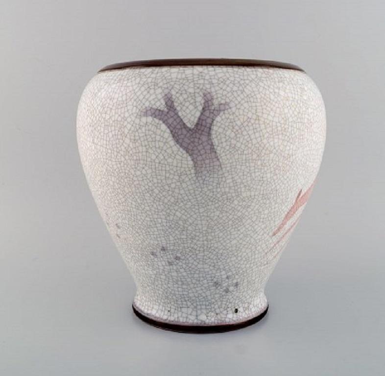 Große Vase von Bing und Grøndahl aus Craquelé-Porzellan mit springendem Tier, 1920er Jahre.
Maße: 24 x 24 cm.
In ausgezeichnetem Zustand.
Unterschrieben.
2. Fabrikqualität.