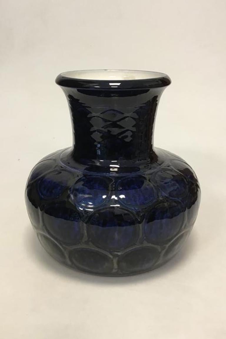 Large Bing & Grondahl stoneware vase by Achton Friis No 27.

Measures 24cm high and 24cm wide (9.45