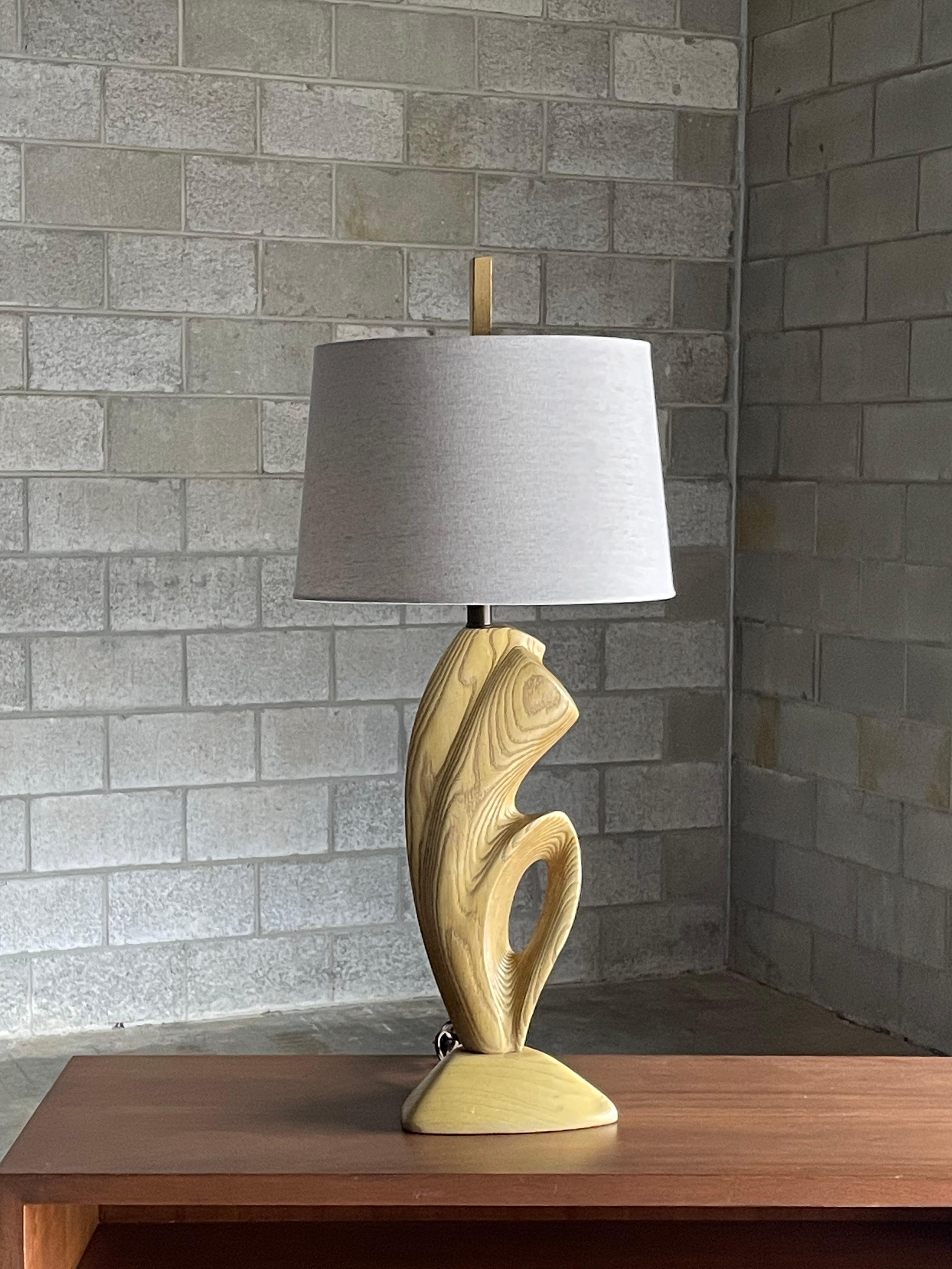 A large scale table lamp attributed to Yasha Heifetz. Wonderful neutral cerused finish. Great presence and organic shape. 

Other notable lamp makers include Modeline, Laurel, etc

Overall
34.5” tall
15” wide

Wooden body 
20” tall
7.25”