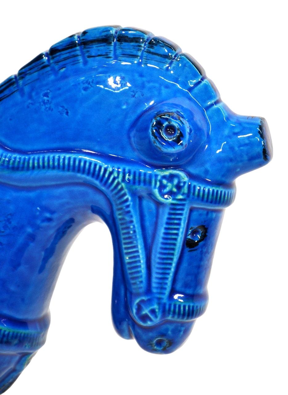 Impressive Italian handmade ceramic horse sculpture in the vibrant signature blue of Aldo Londi's iconic art pottery collection Rimini Blu, originally designed in 1959 for Bitossi Ceramiche and imported by Raymor in the 1960s. The deep blue glaze