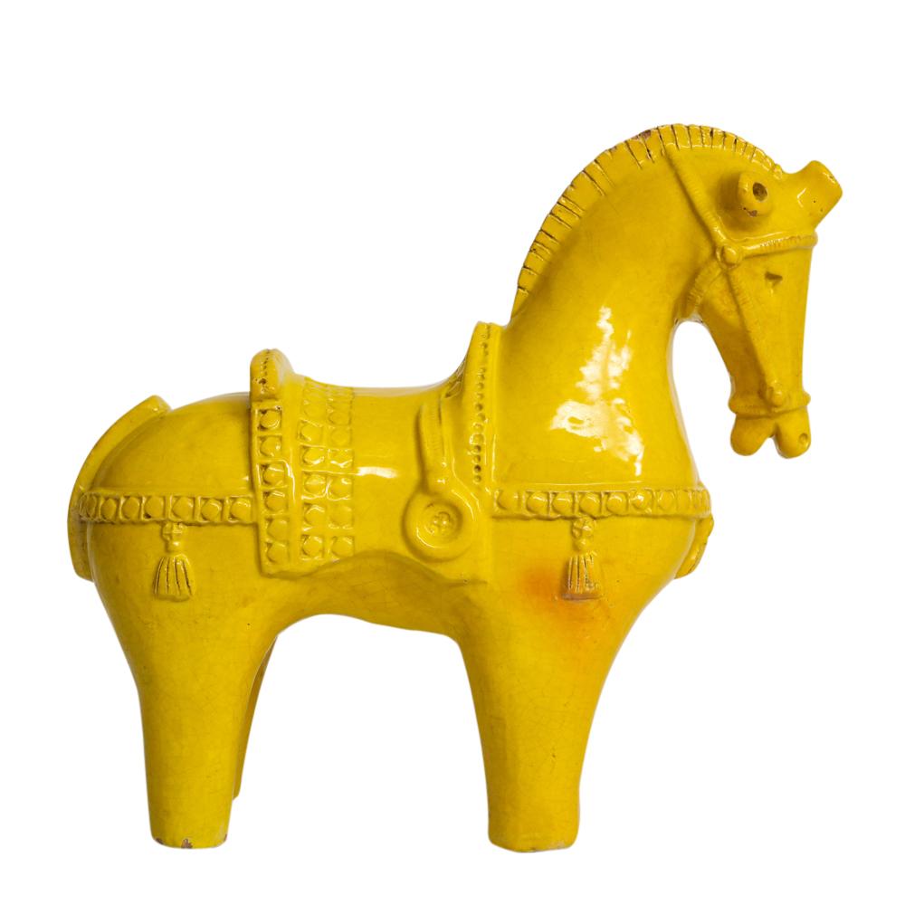 Bitossi horse, ceramic, large yellow, signed. At 18 inches in length, this was the largest horse Bitossi produced. The orange under glaze has bleed through in one spot above the front leg, only visible on one side. Signed on the underside of one of