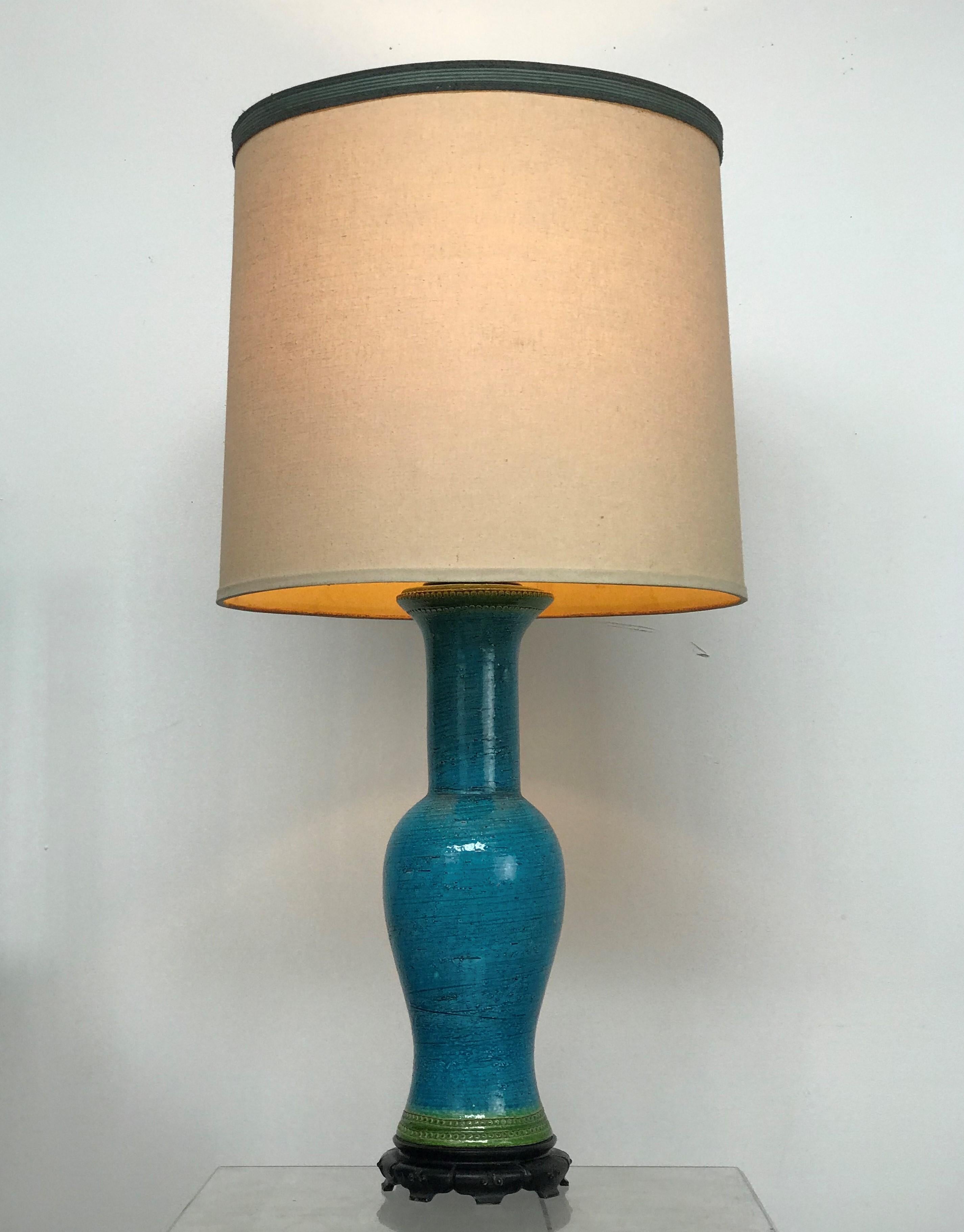 Lovely 1960's large ceramic blue & green Italian modern lamp by Bitossi combined with a Chinoiserie iron base for Wilmar Lighting. Excellent condition. No chips or cracks or any blemishes. 

The shade is not included - it has a lot of wear. The