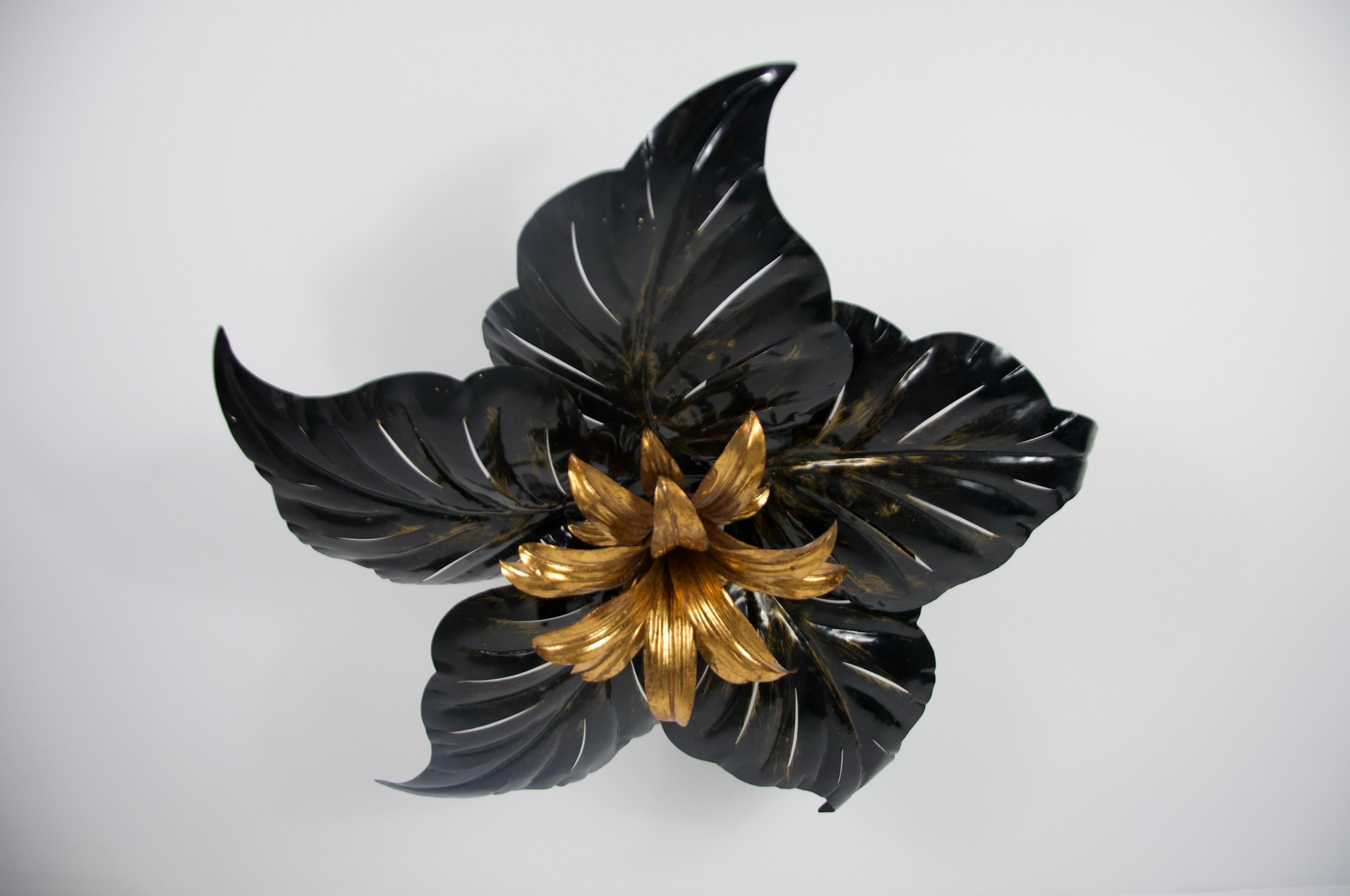 This striking flush mount ceiling light by Hans Kögl, created in Germany during the 1960s, is a bold statement piece that captures the essence of mid-century glamor. Designed in the shape of a lush floral motif, the lamp features dramatically
