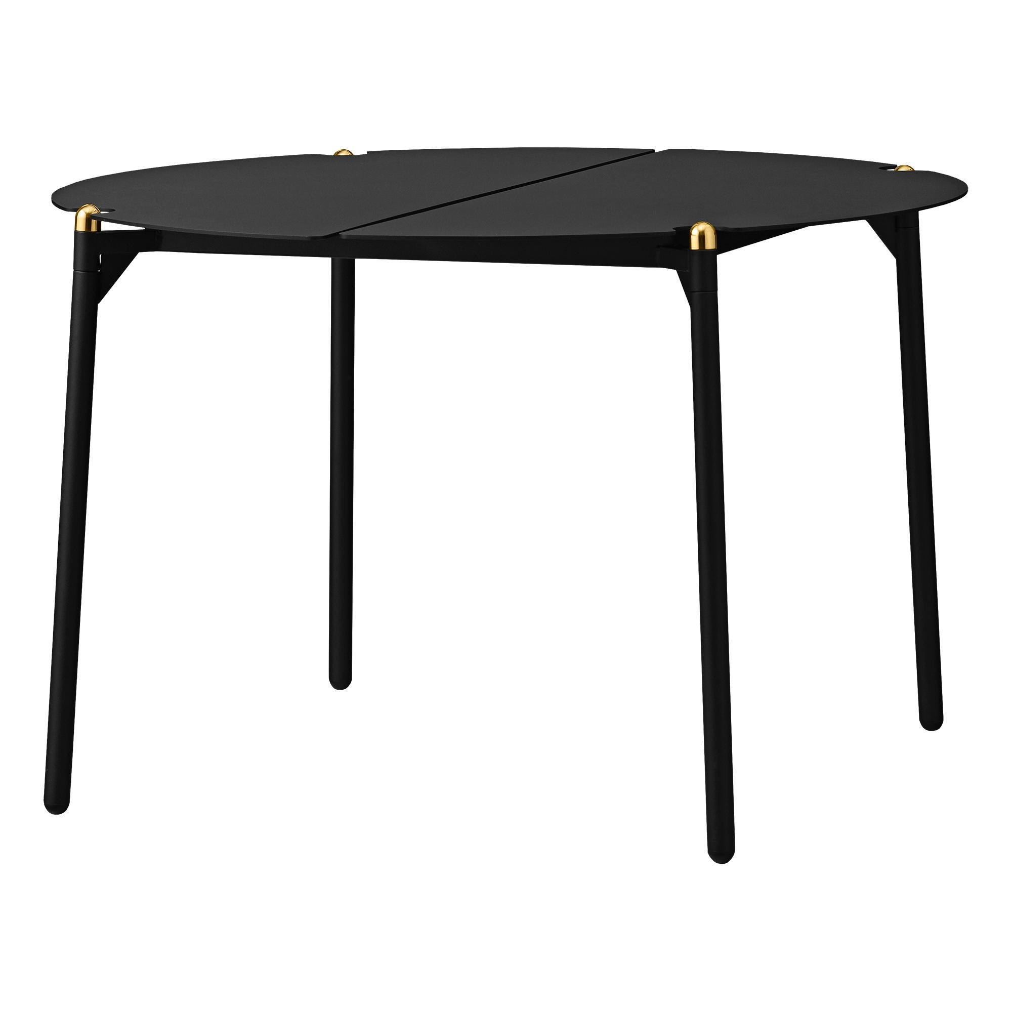 Large black and gold minimalist lounge table
Dimensions: Diameter 70 x H 45 cm 
Materials: Steel w. Matte Powder Coating, Aluminum w. Matte Powder Coating & Stainless Steel w. Gold Titanium Plating.
Available in colors: Taupe, Bordeaux, Forest,