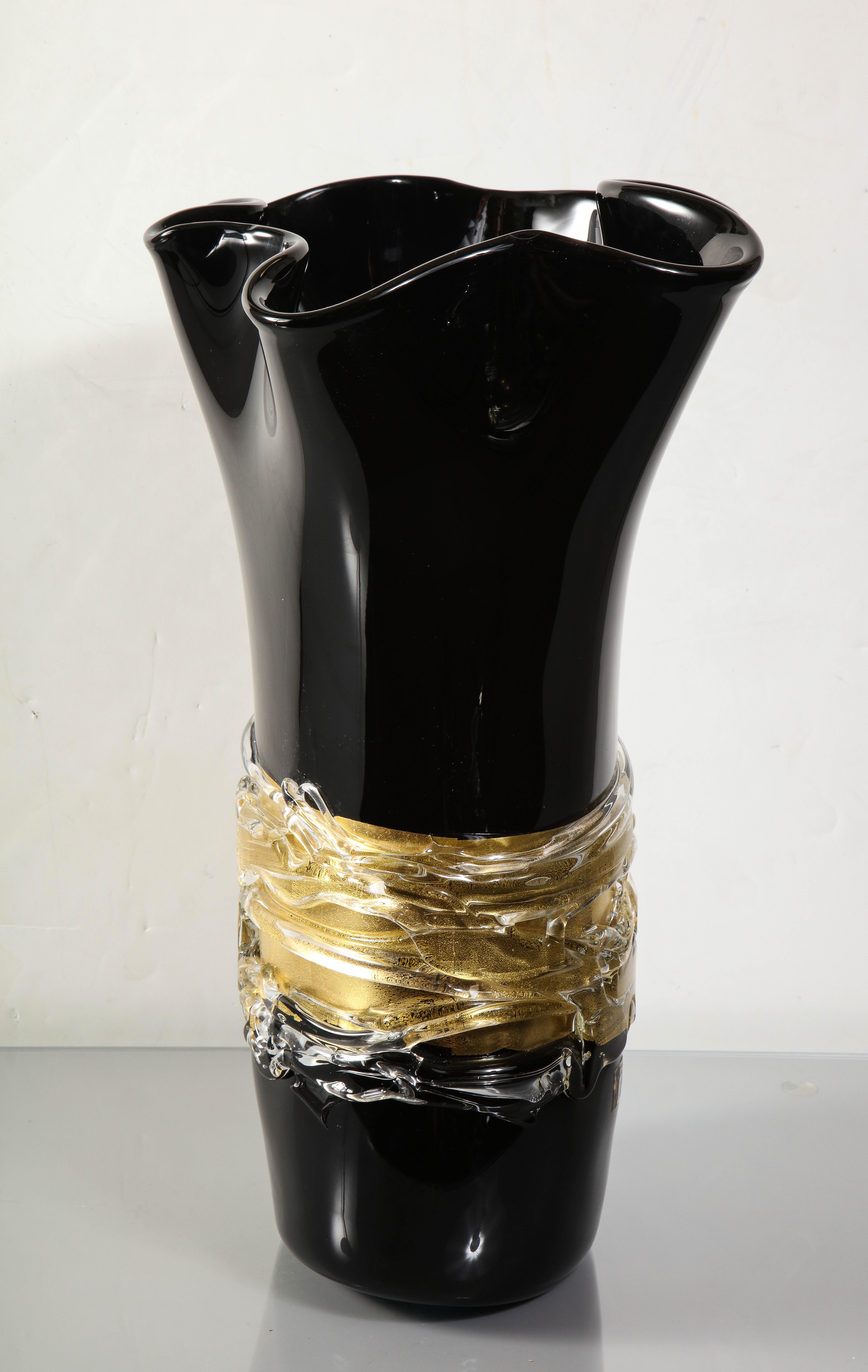 large black and gold vase