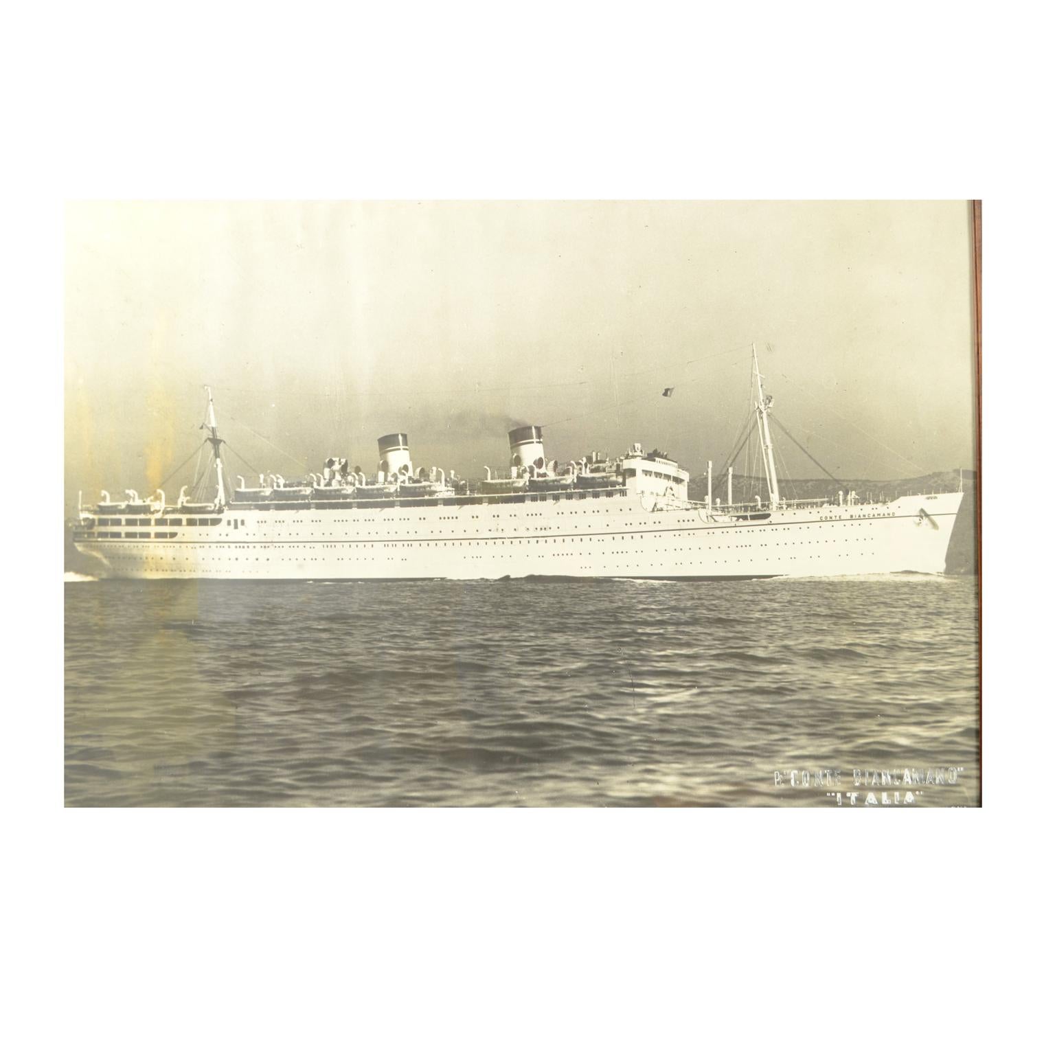 Black and white poster depicting the steamship Conte Biancamano Italia Società di navigazione Genova. Coeval frame. Good condition. Including frame 103 x 79 cm.

Launched in 1925, Conte Biancamano is considered the first Italian 