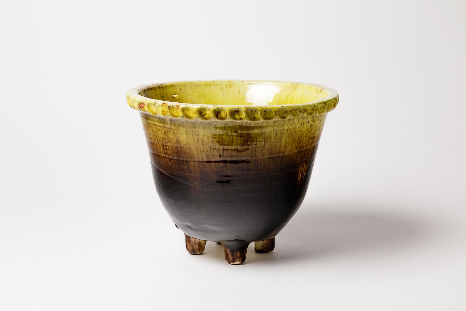 Accolay

Large and elegant mid-20th century ceramic flower pot, circa 1960.

Signed under the base.

Shiny black and yellow ceramic glazes colors.

Perfect original conditions

Measures: Height 22 cm, large 26 cm.
