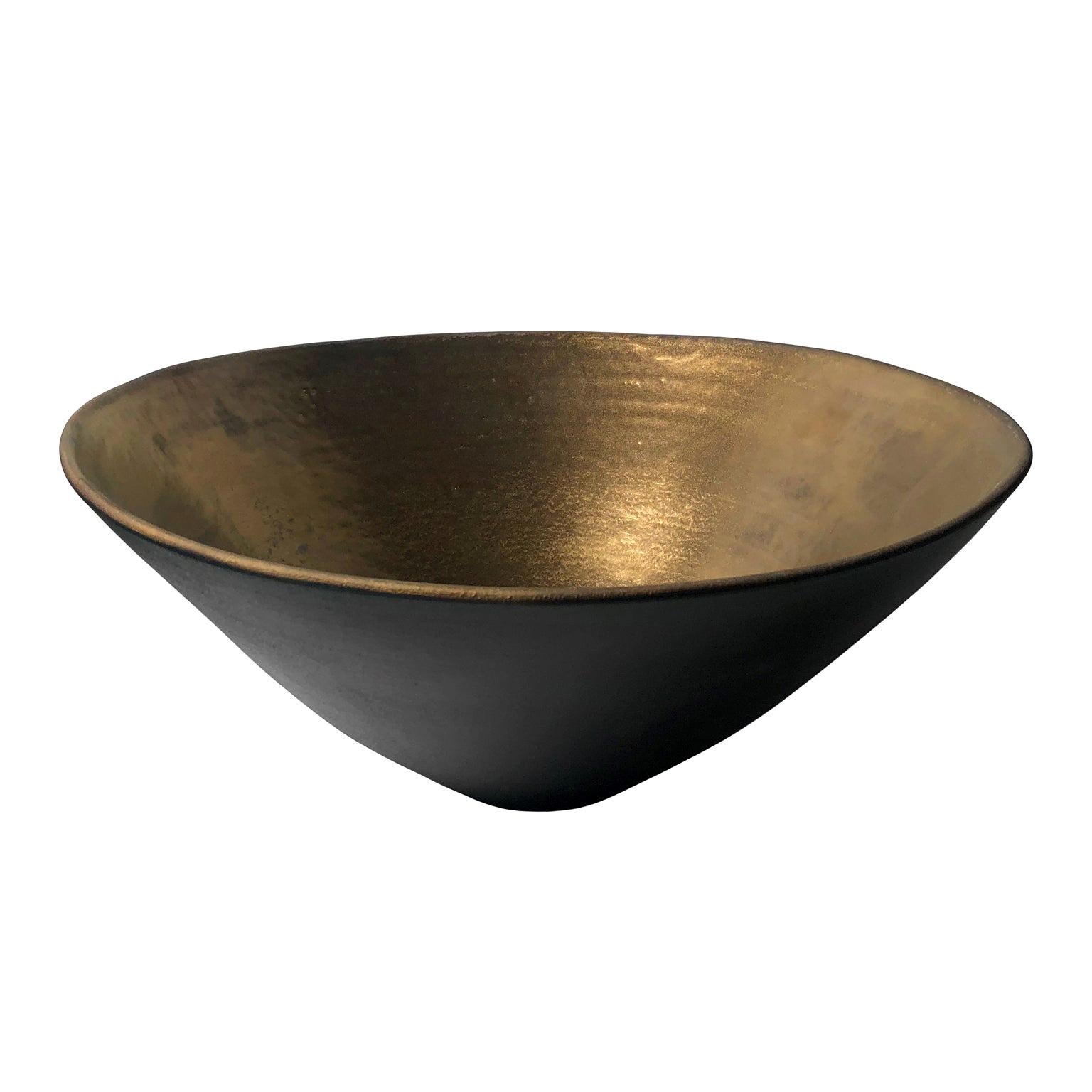 Large Black Ceramic Bowl with Gold Glaze Interior and Pointed Base at