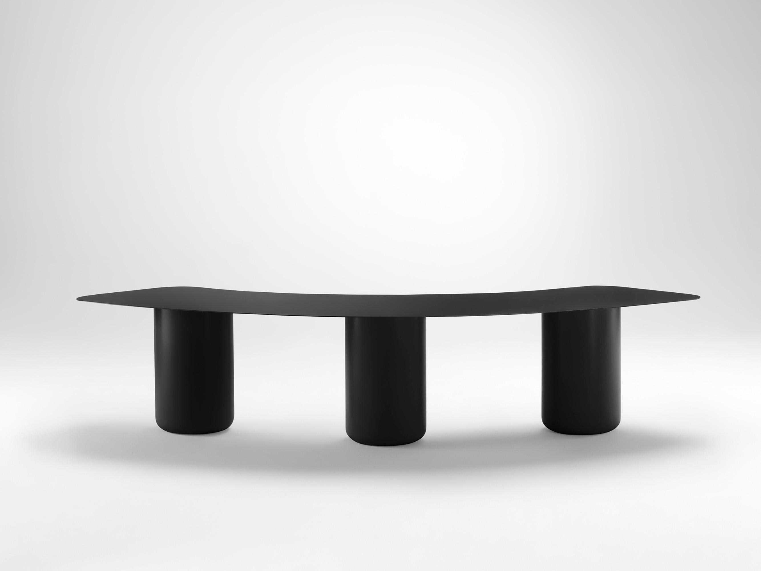 Large Black Curved Bench by Coco Flip
Dimensions: D 75 x W 200 x H 42 cm
Materials: Mild steel, powder-coated with zinc undercoat. 
Weight: 44 kg

Coco Flip is a Melbourne based furniture and lighting design studio, run by us, Kate Stokes and