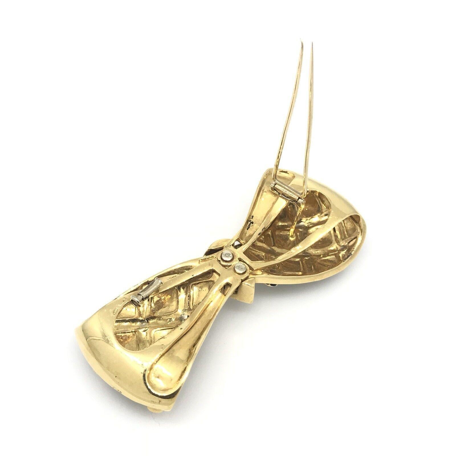 Broche en or jaune 18k avec nœud en émail noir et diamants Pour femmes en vente
