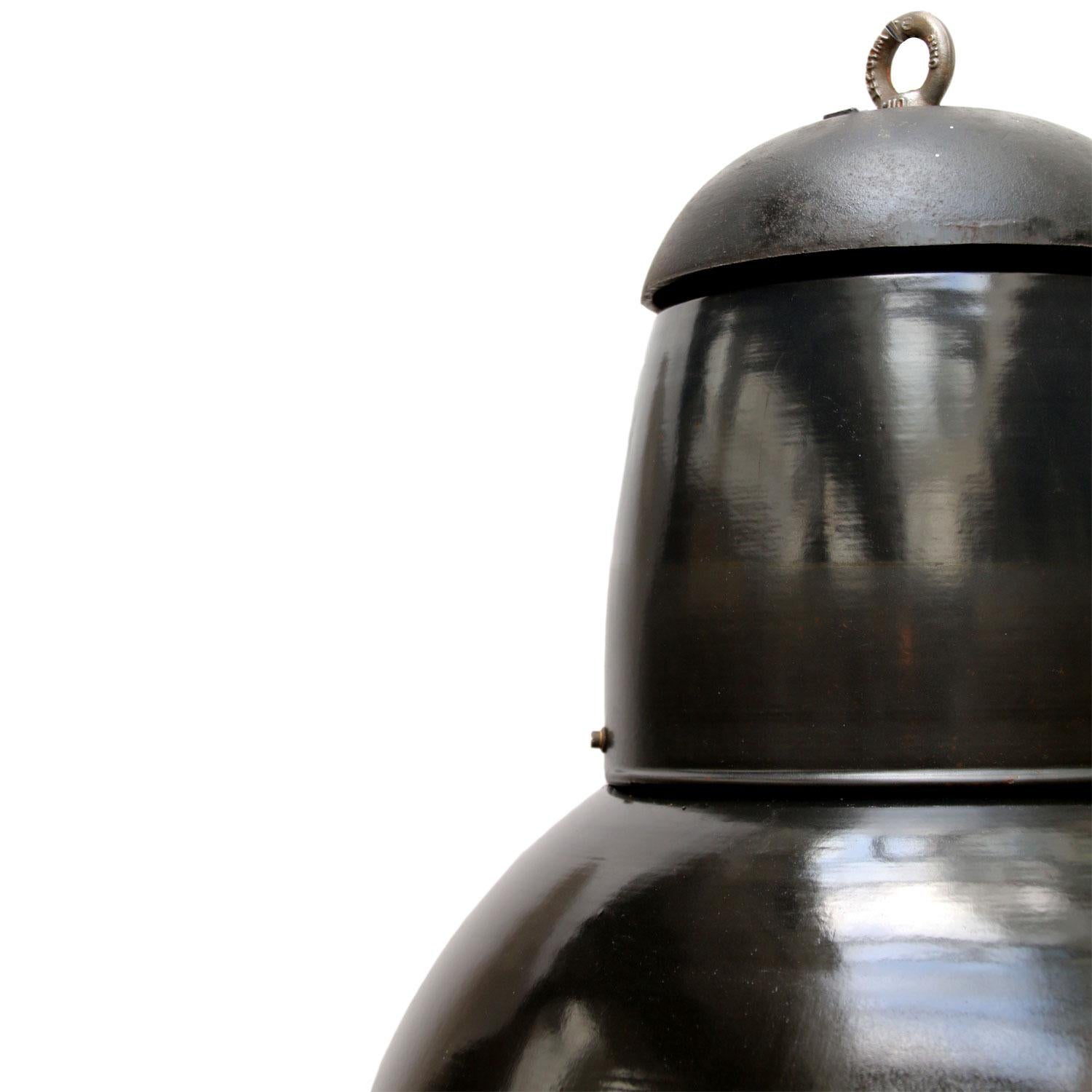 Black enamel Industrial pendant.
Cast iron top. White interior.

Weight: 7.5 kg / 16.5 lb

Priced per individual item. All lamps have been made suitable by international standards for incandescent light bulbs, energy-efficient and LED bulbs. E26/E27